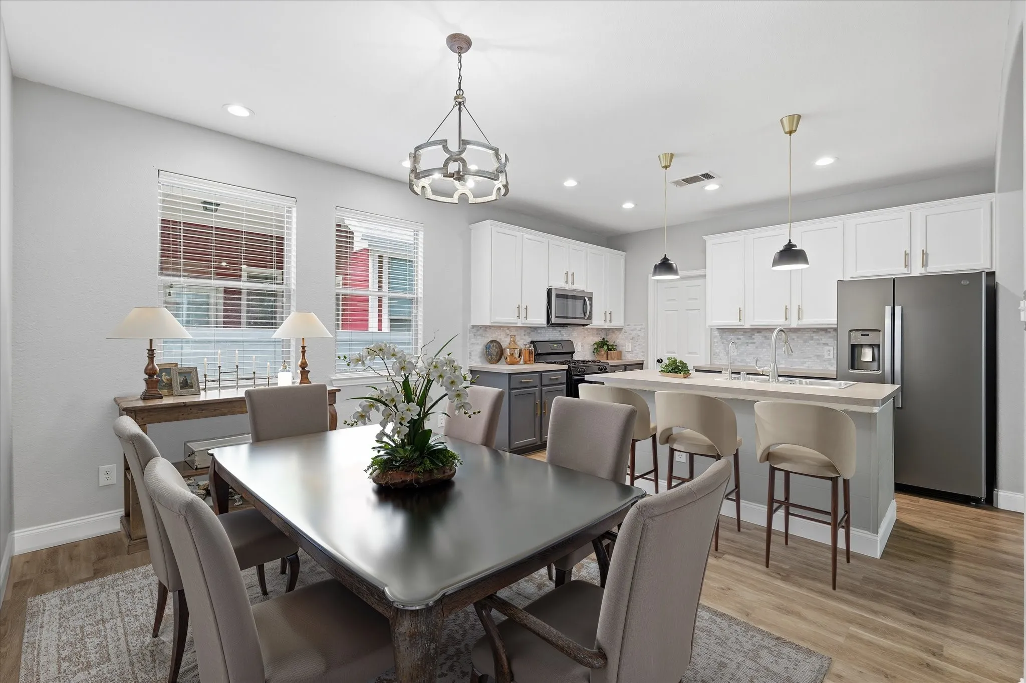 Virtually staged dining and kitchen