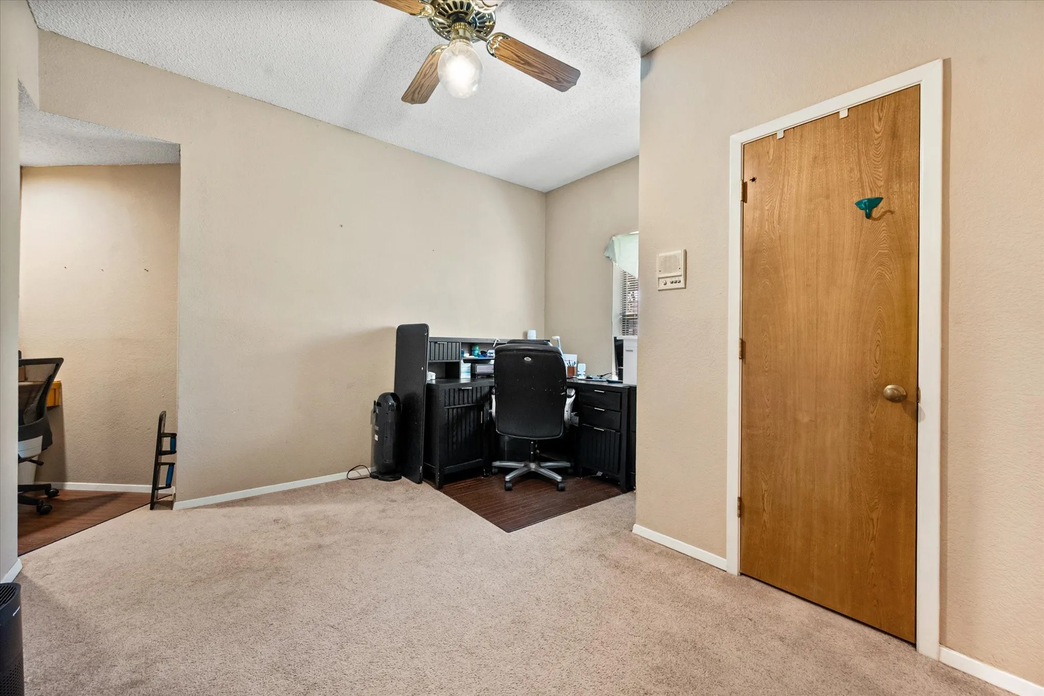 Bedroom that is versatile and could be used as a great home office.