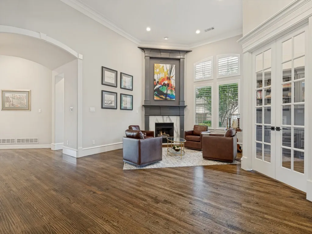 Living area with double-stacked fireplace and  perfect for after dinner coffee.