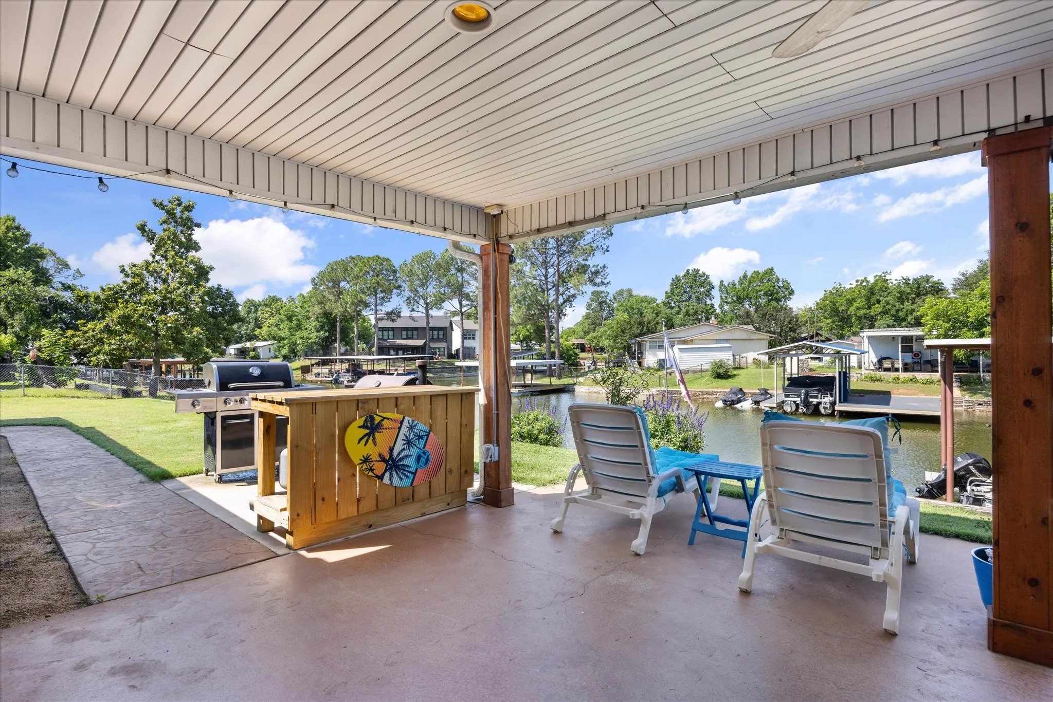 Covered patio with concrete flooring, recessed lighting, and a ceiling fan