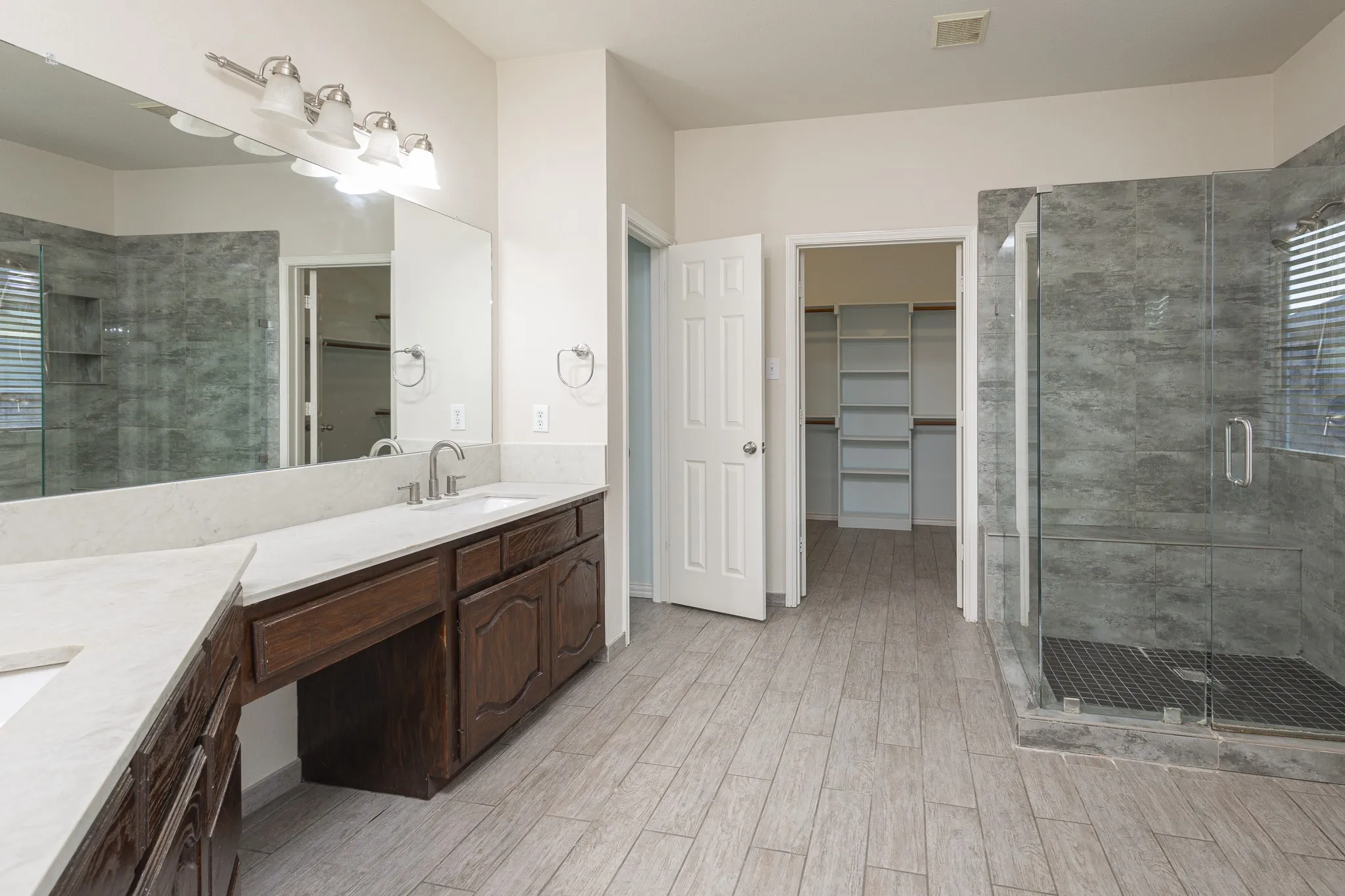 Bathroom with walk in shower and oversized vanity
