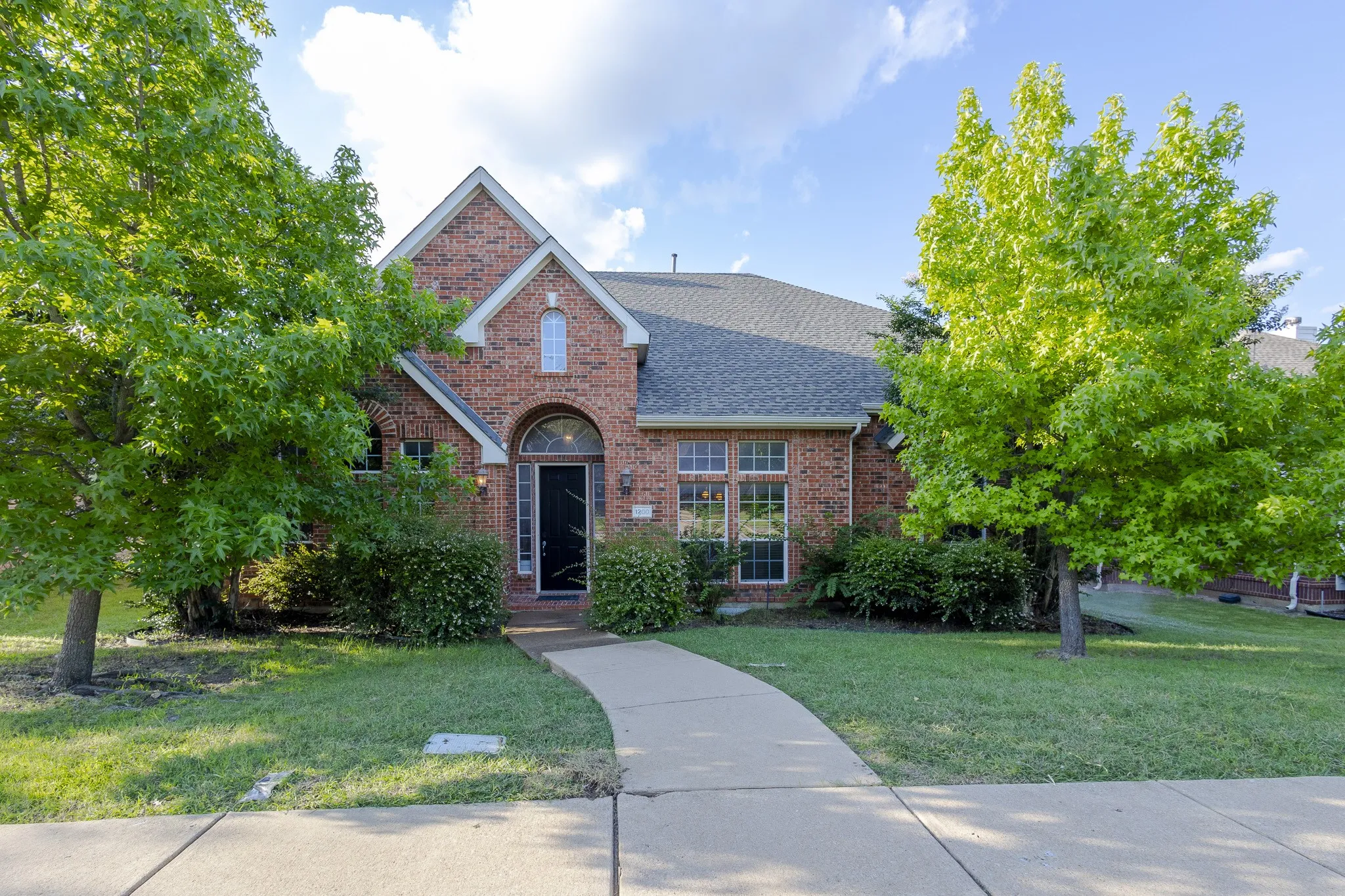 View of front of home with a front yard
