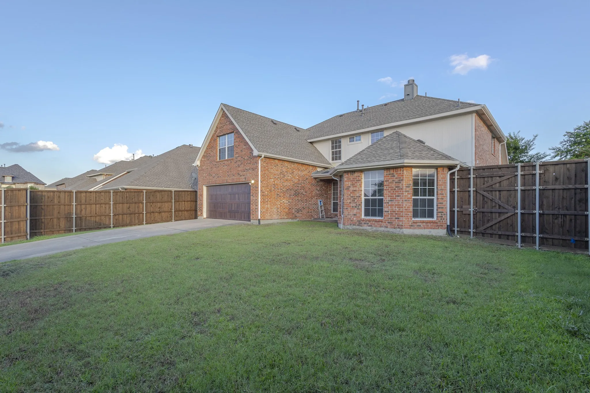 View of yard with a garage