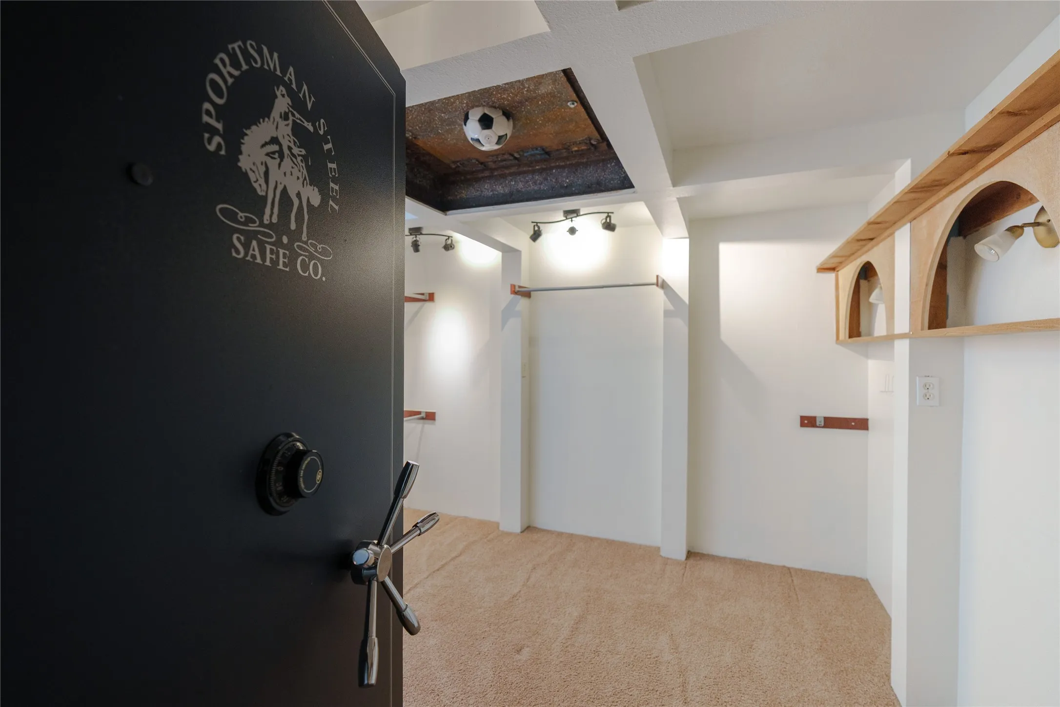 Safe Room with Sportsman Steel Safe Co. Also used as closet for main bedroom.