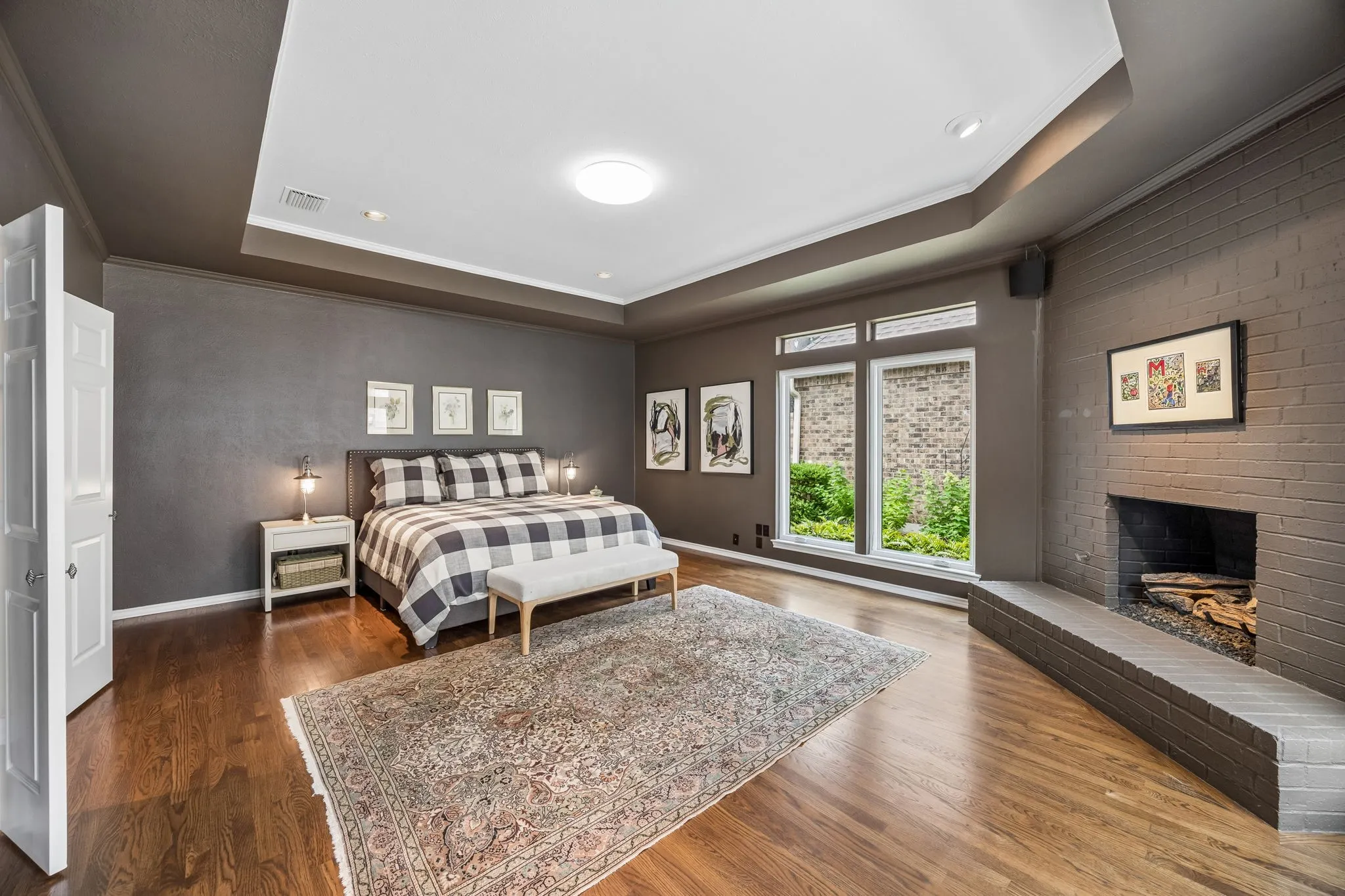 Spacious primary suite with fireplace