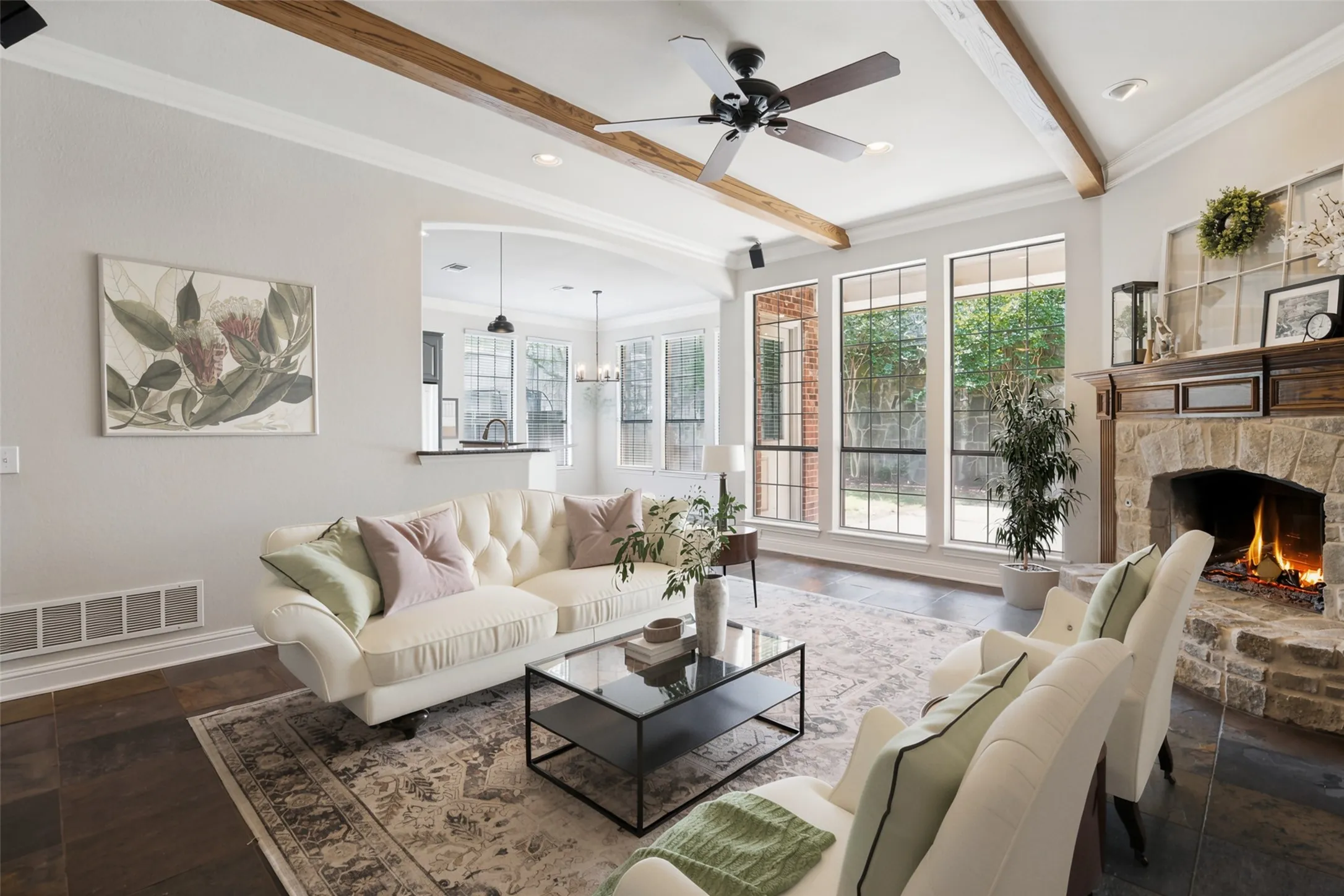 Virtually staged. Spacious living room with fireplace.