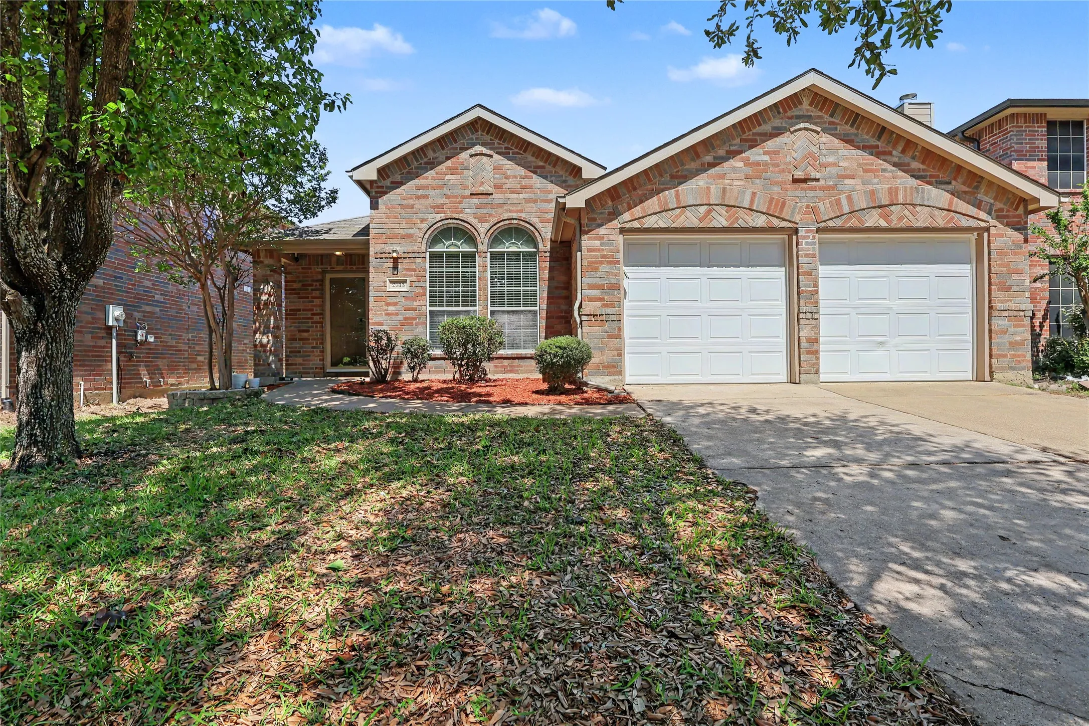 Brick exterior with arched window details