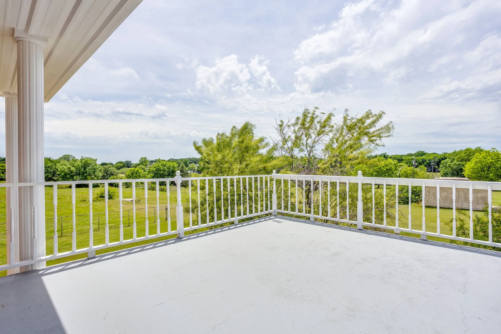 balcony off the upstairs primary bedroom