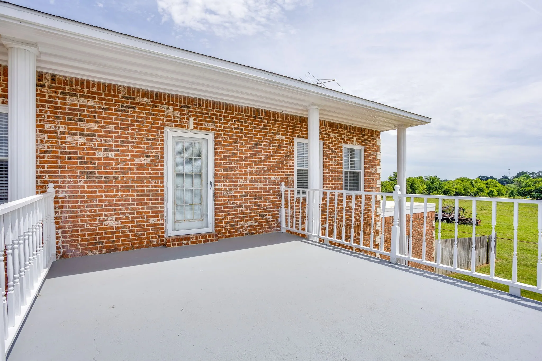 balcony off the upstairs primary bedroom