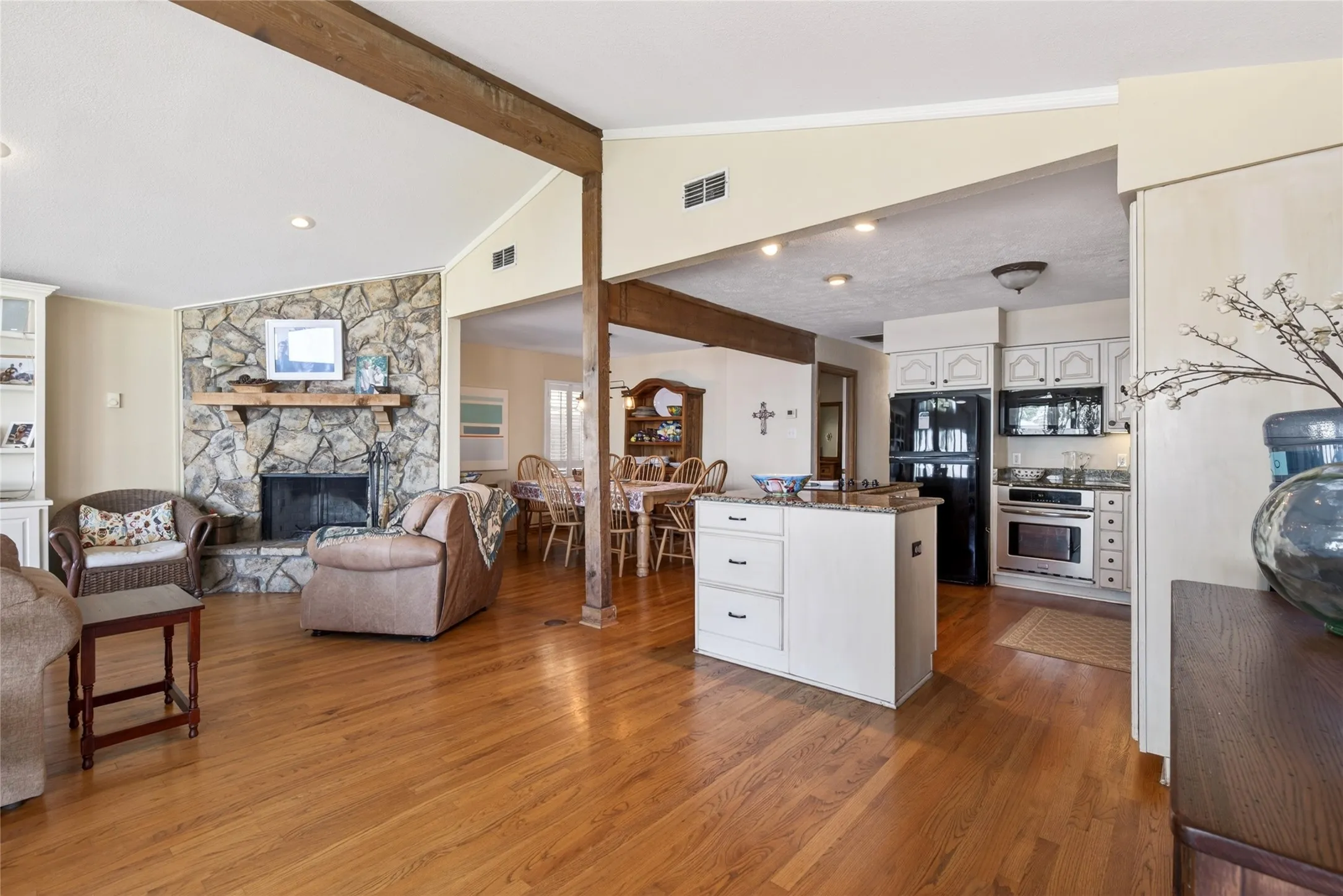 Open floor plan with the Living, Kitchen and Dining.
