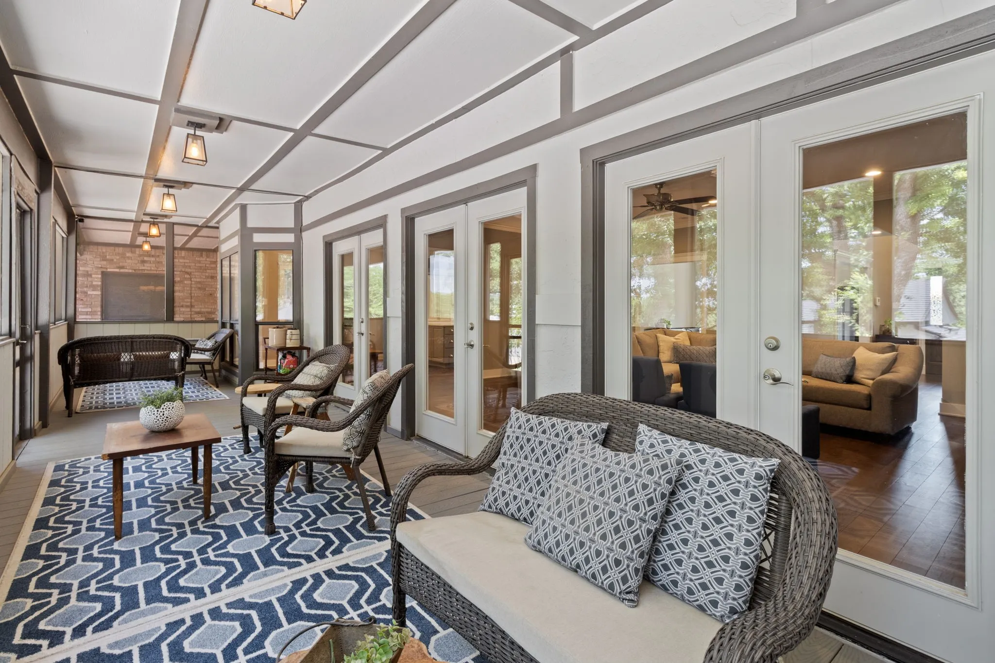 Step outside and into the screened-enclosed Sun Room, with entrance from 3 different locations.