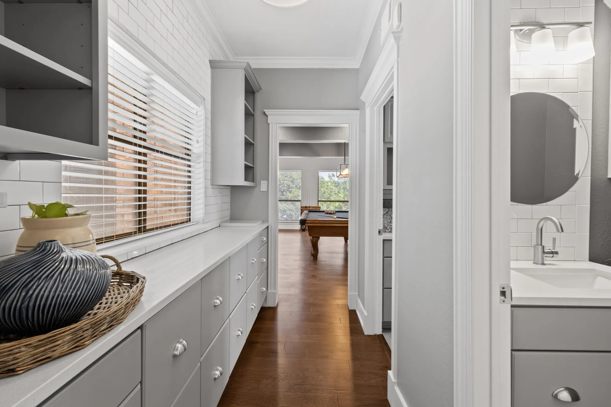 A butler's pantry, with more storage and counter space.