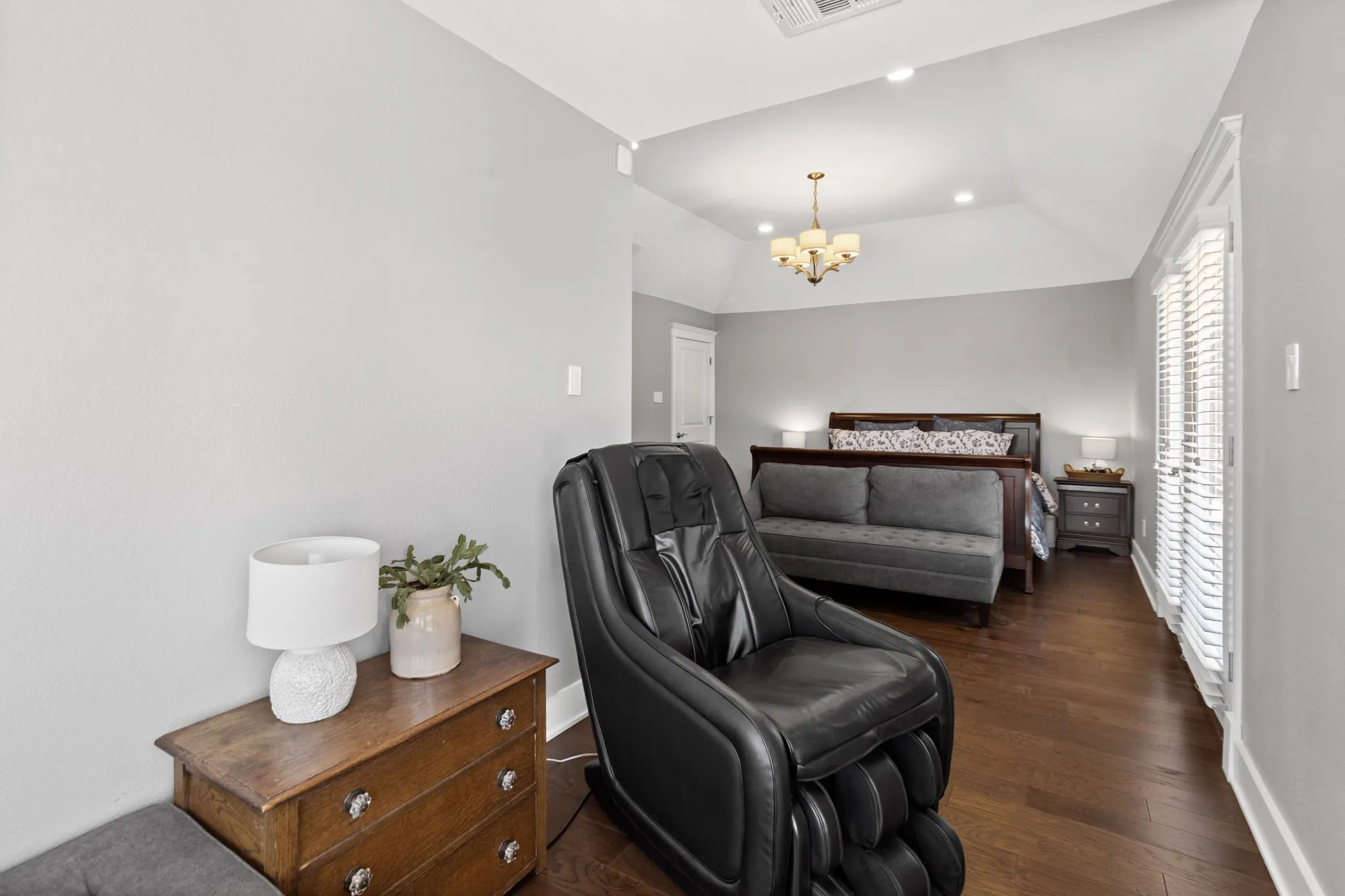 Primary Suite with sitting area and access to outdoor patio.