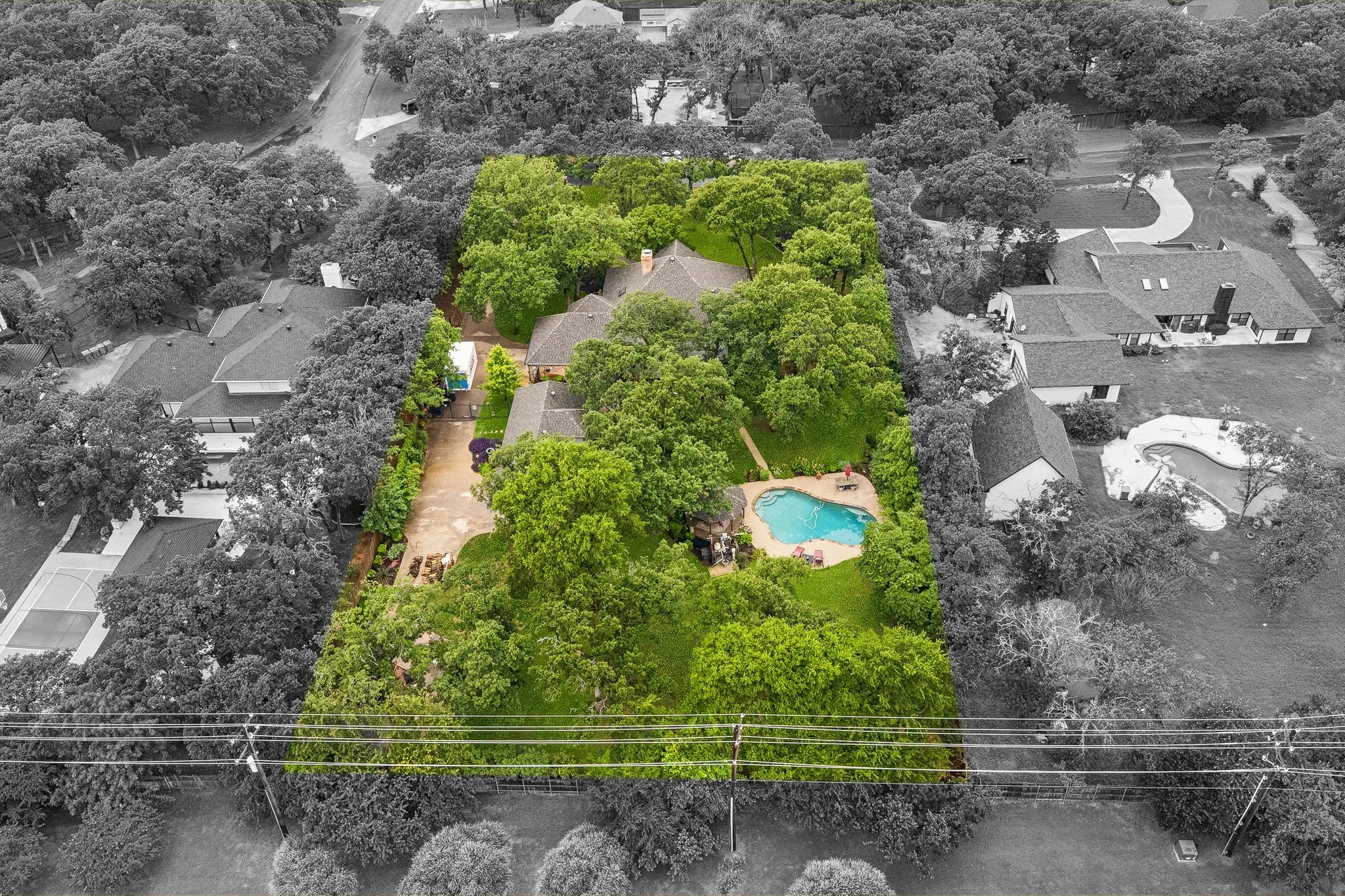 Showing the boundary lines of the 1 acre property.
