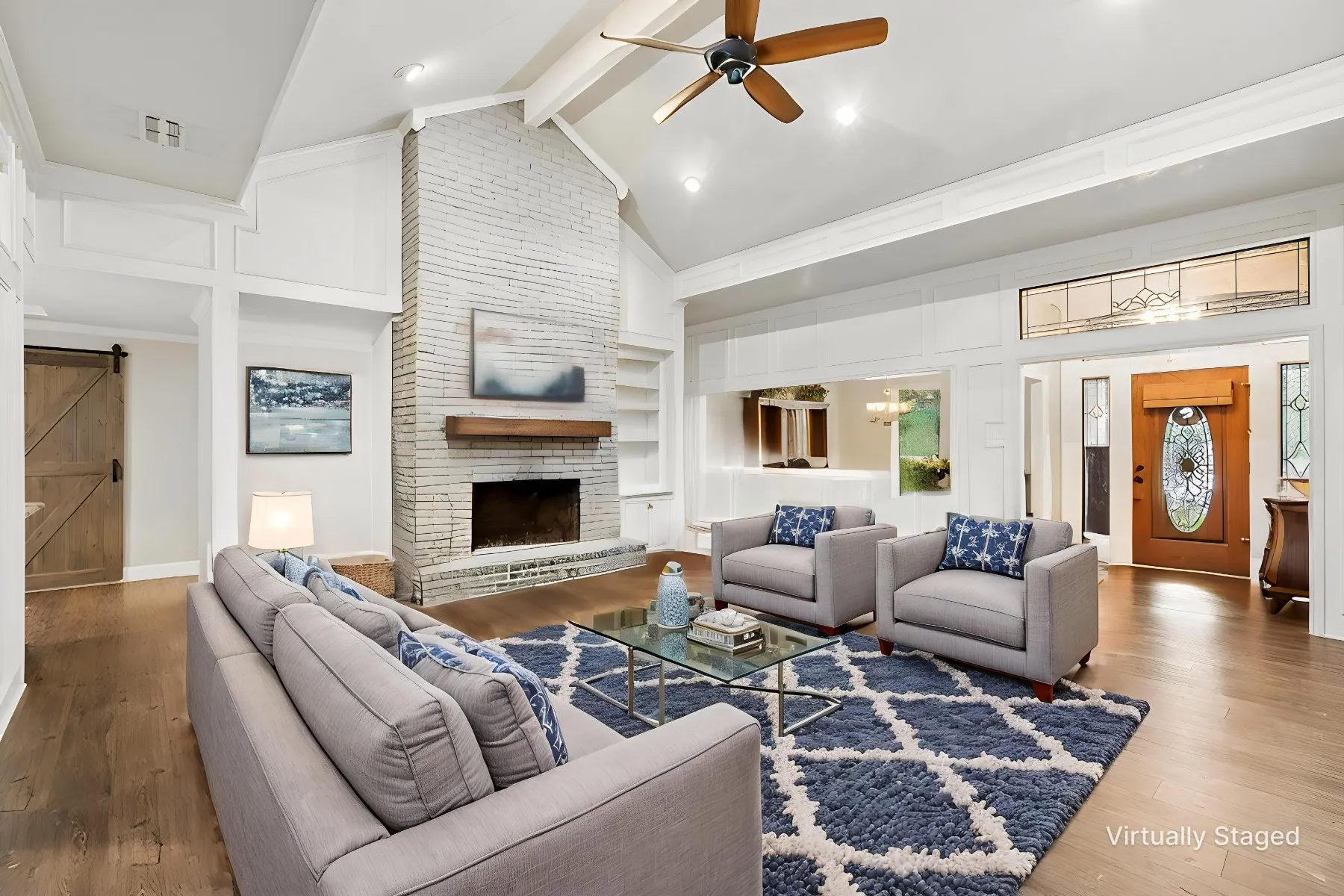 Family Room Open to the dining or office with main feature a wood burning fireplace.