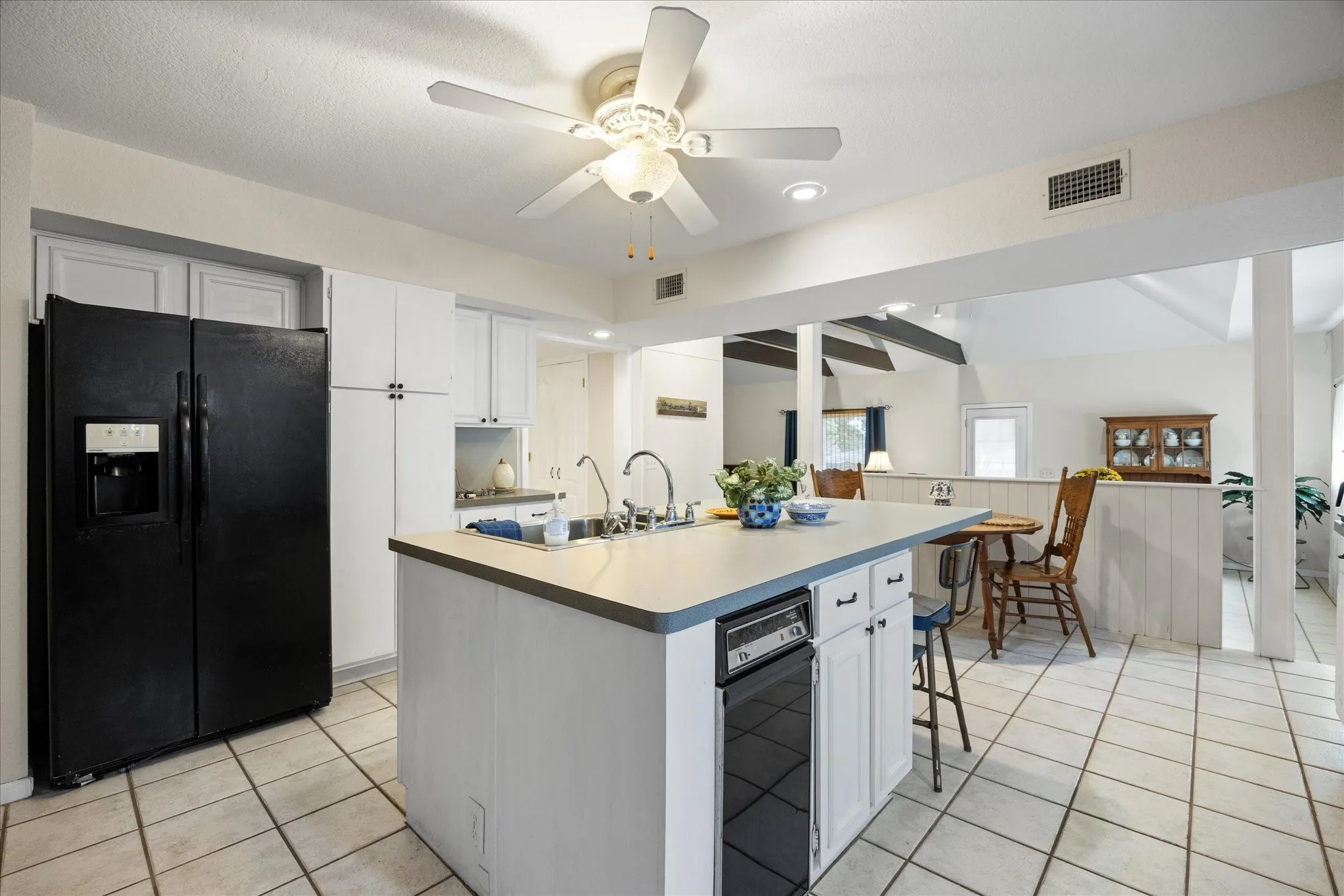 Kitchen looking towards formal dining area.
