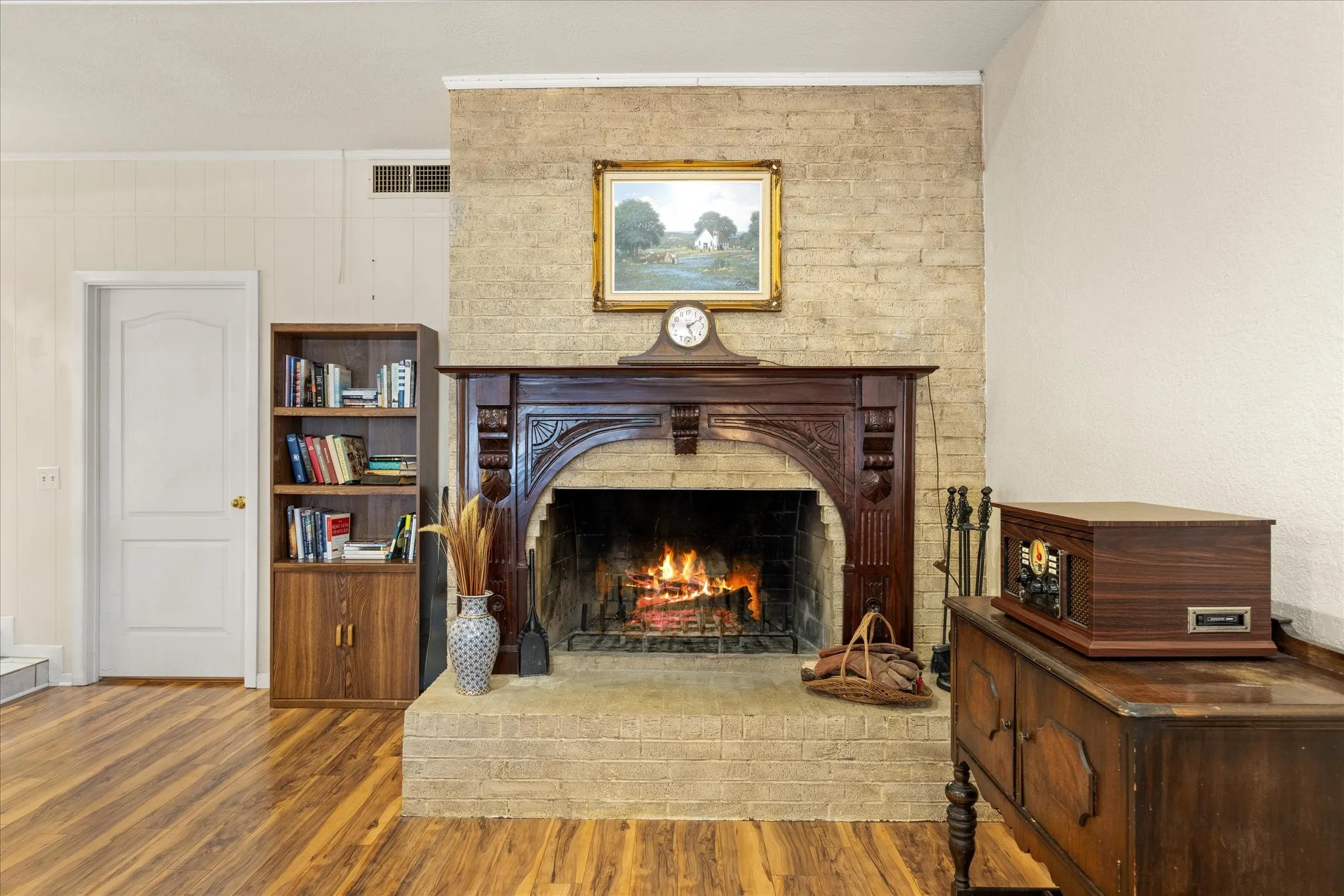 Very majestic and large fireplace in living area.
