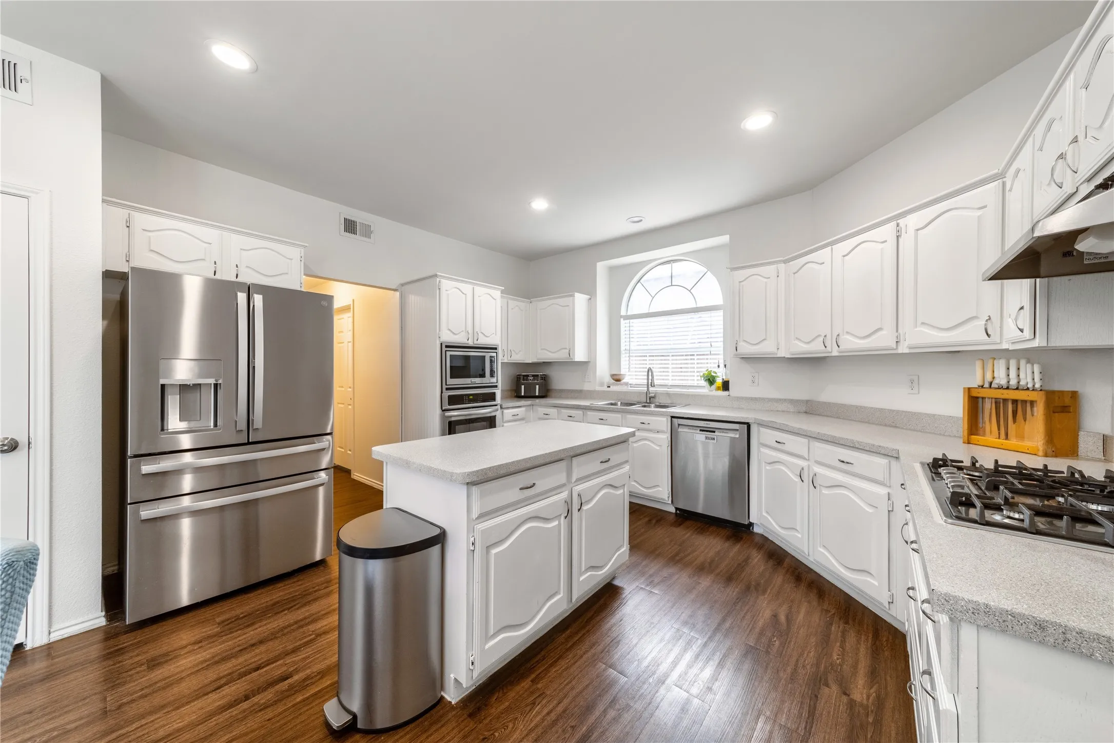 Eat in kitchen with access to back patio and garage