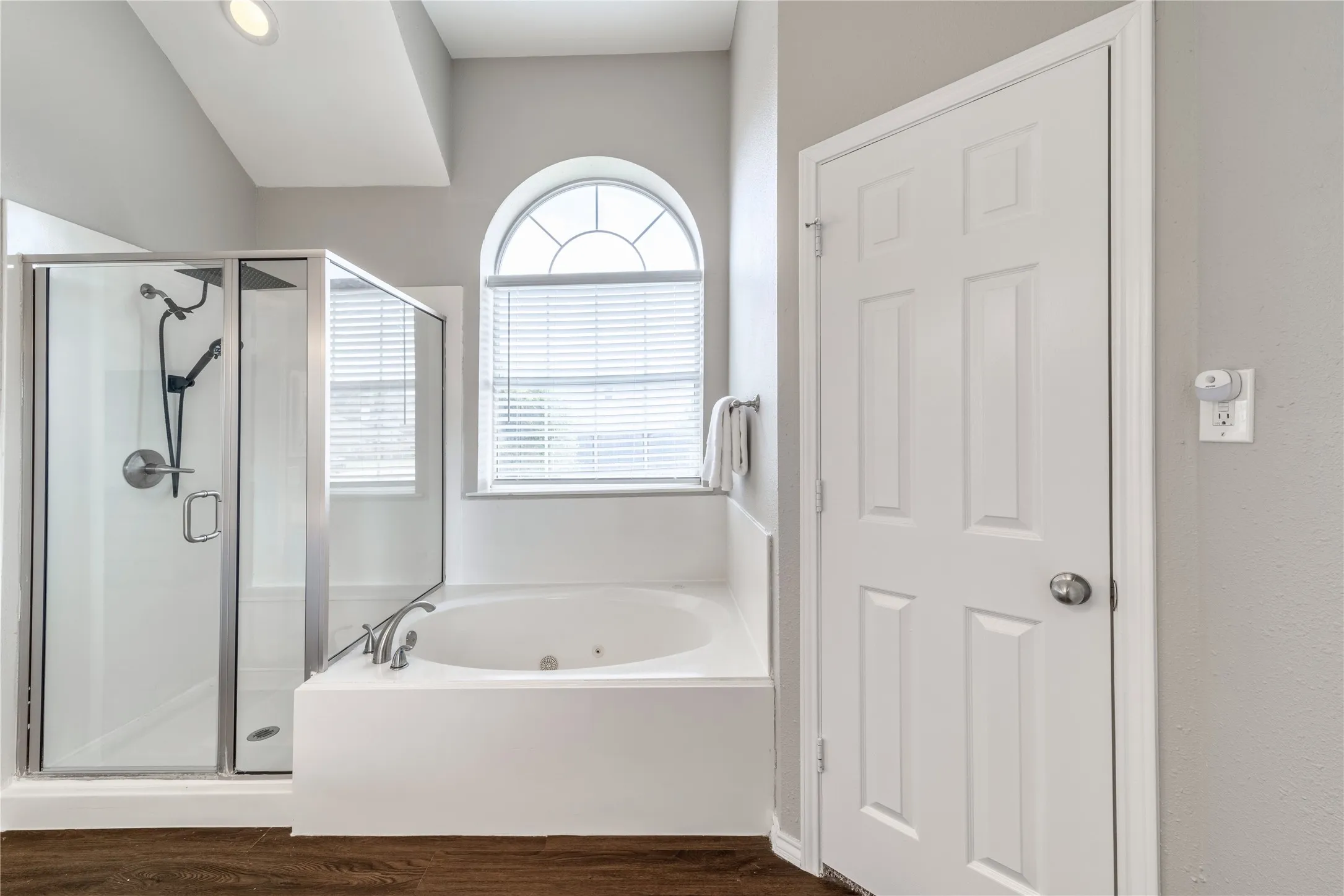 Primary bathroom with walk-in closets