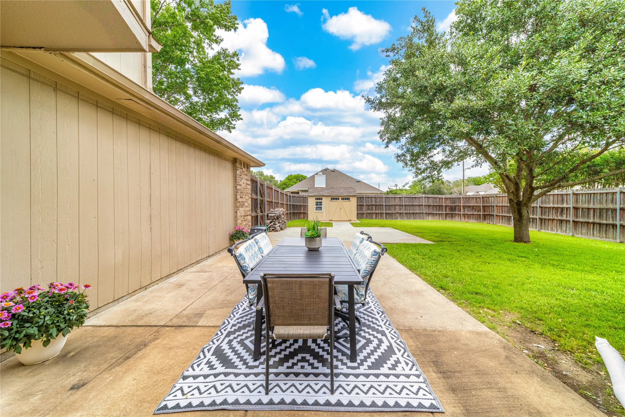Sun soaked patio with a new 12x8 shed