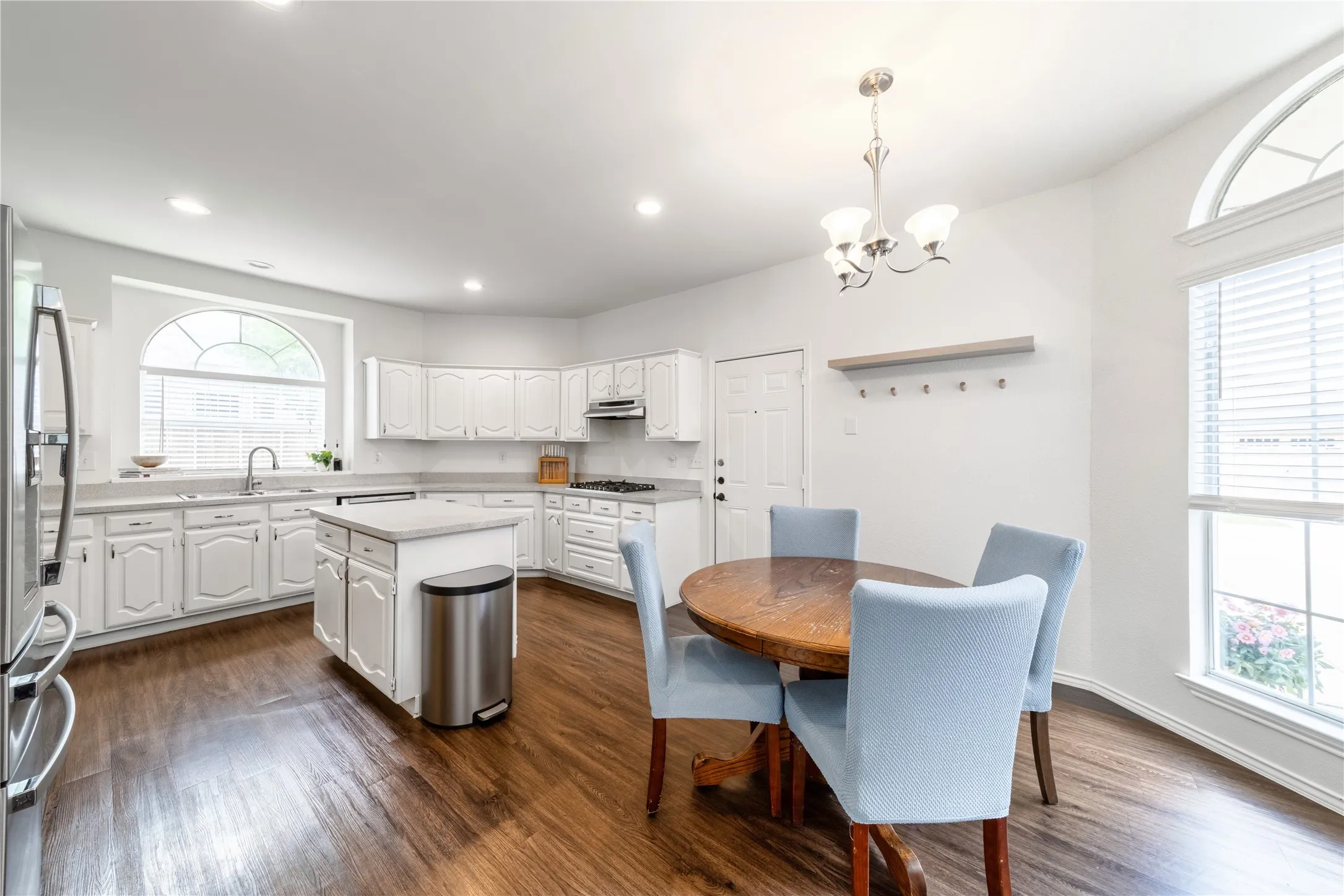 Eat in kitchen with access to back patio and garage