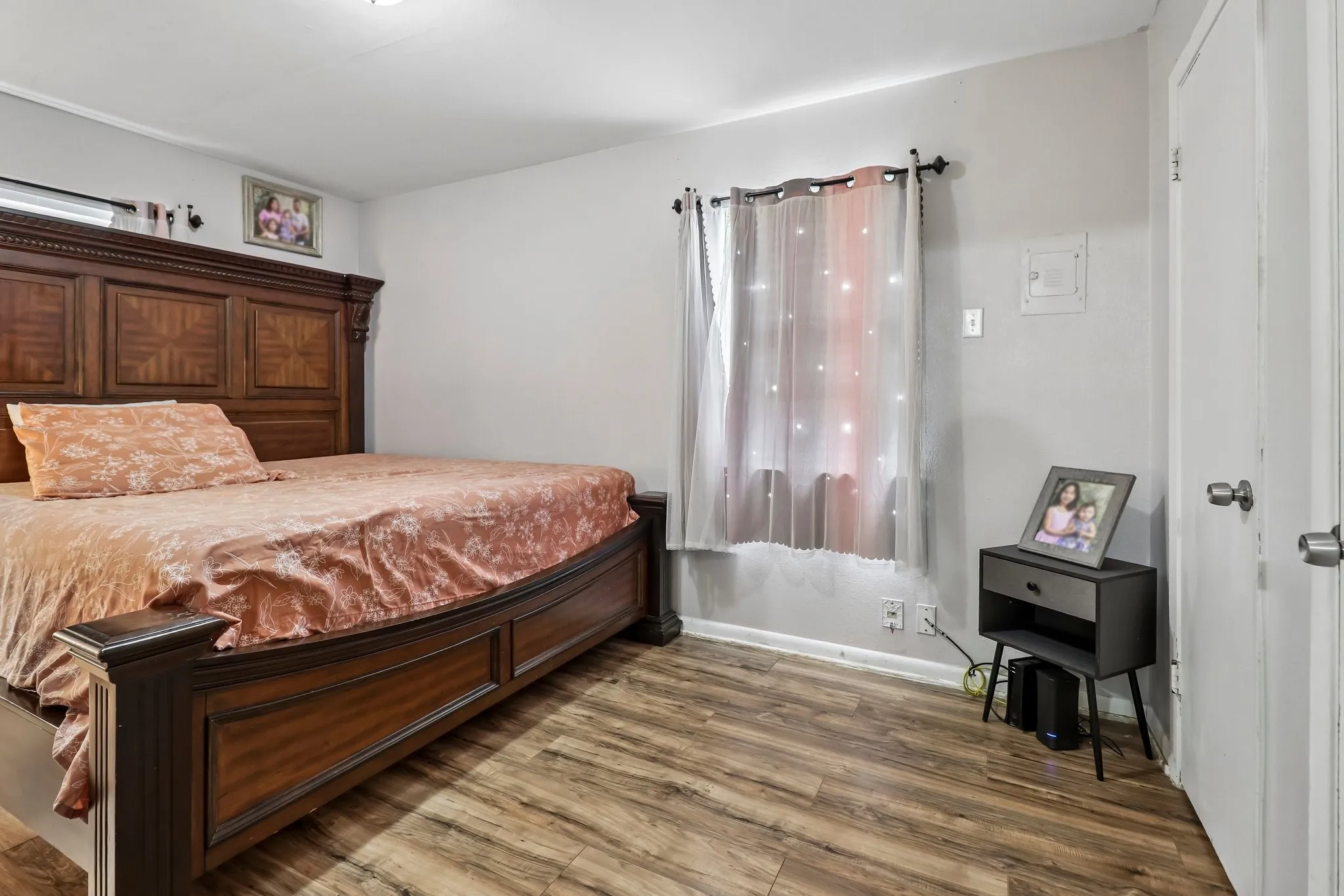 Wood-finish flooring with light-toned walls