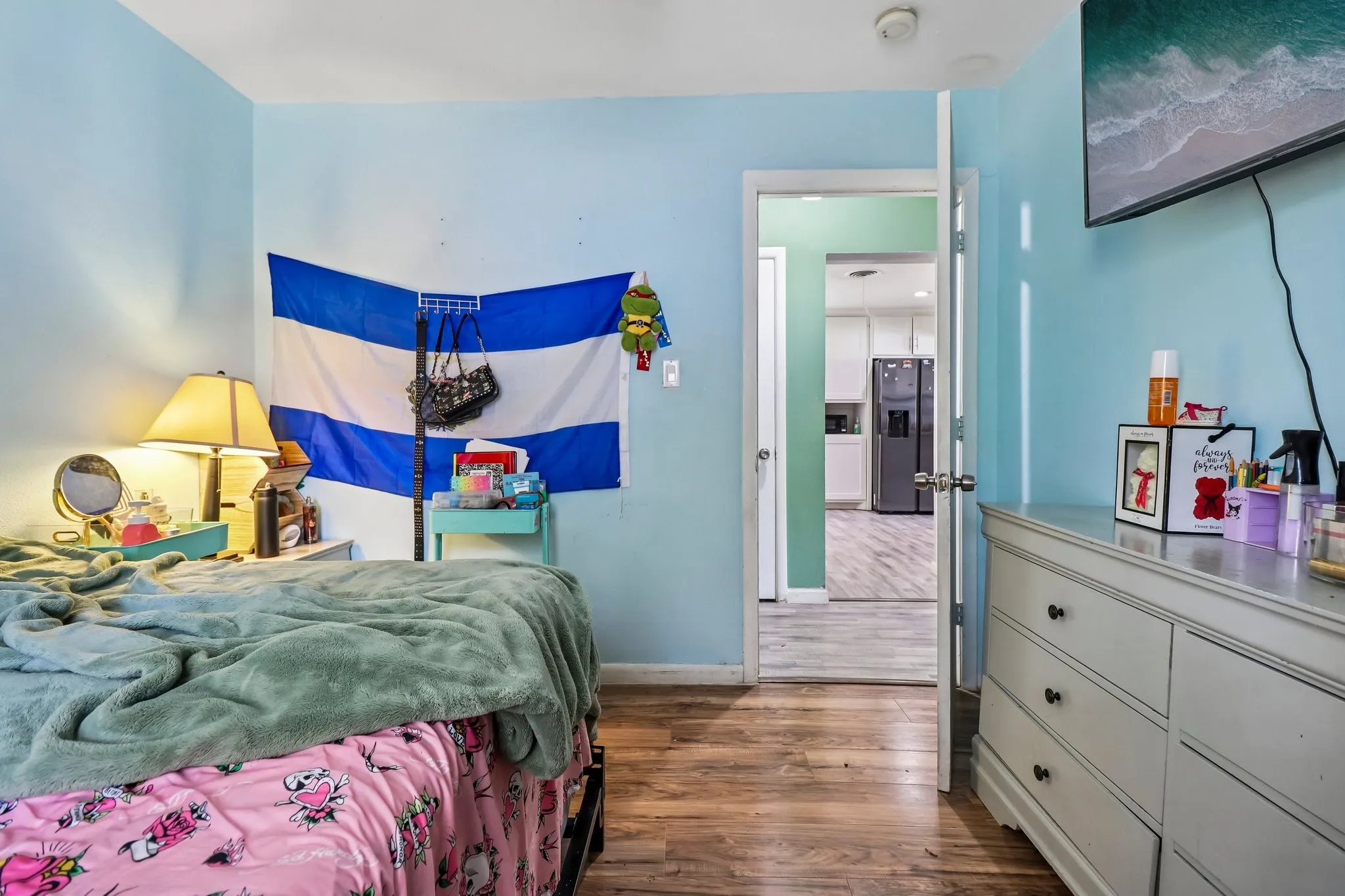 Wood-finish flooring throughout the space