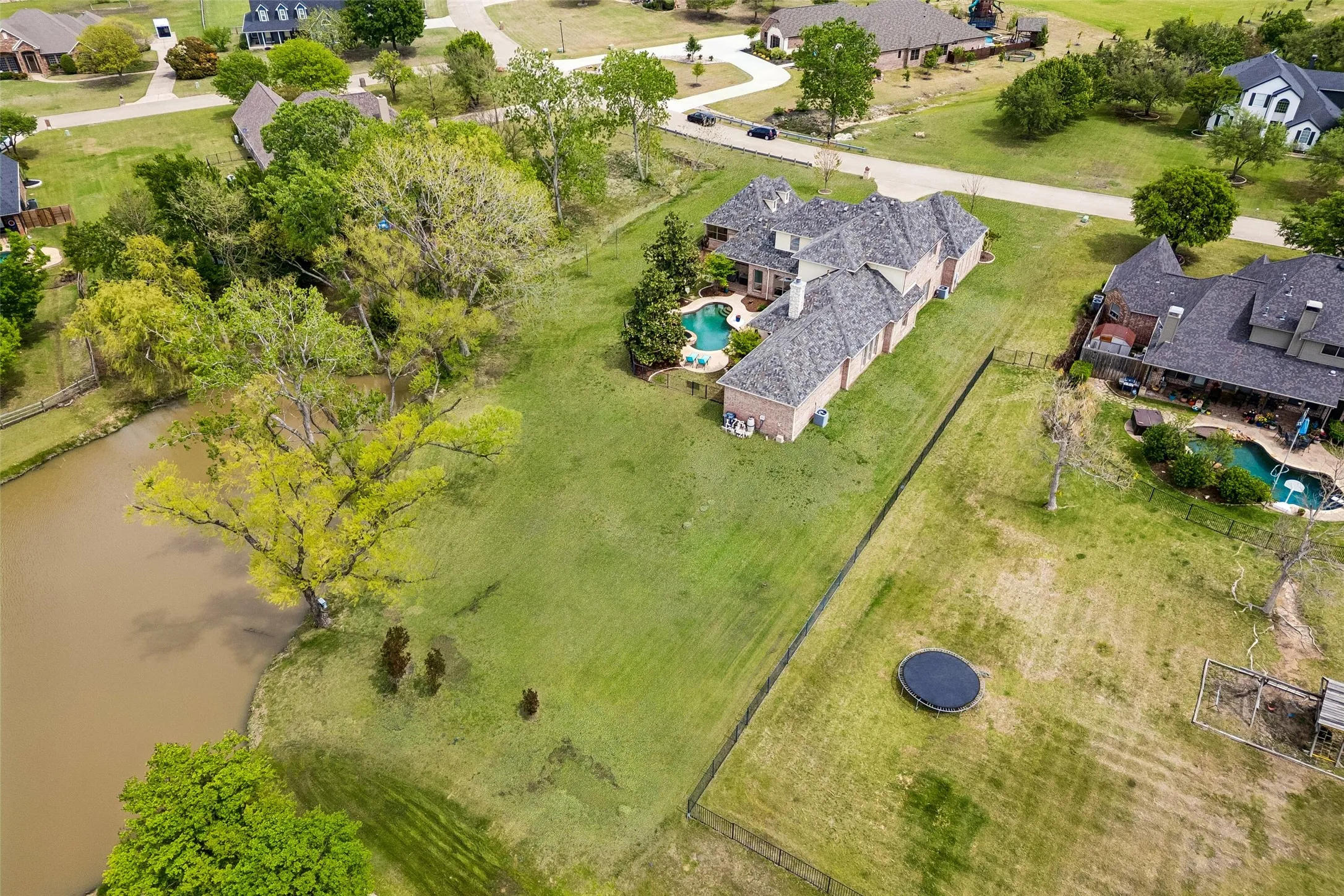 Lot has direct view of the neighborhood pond.