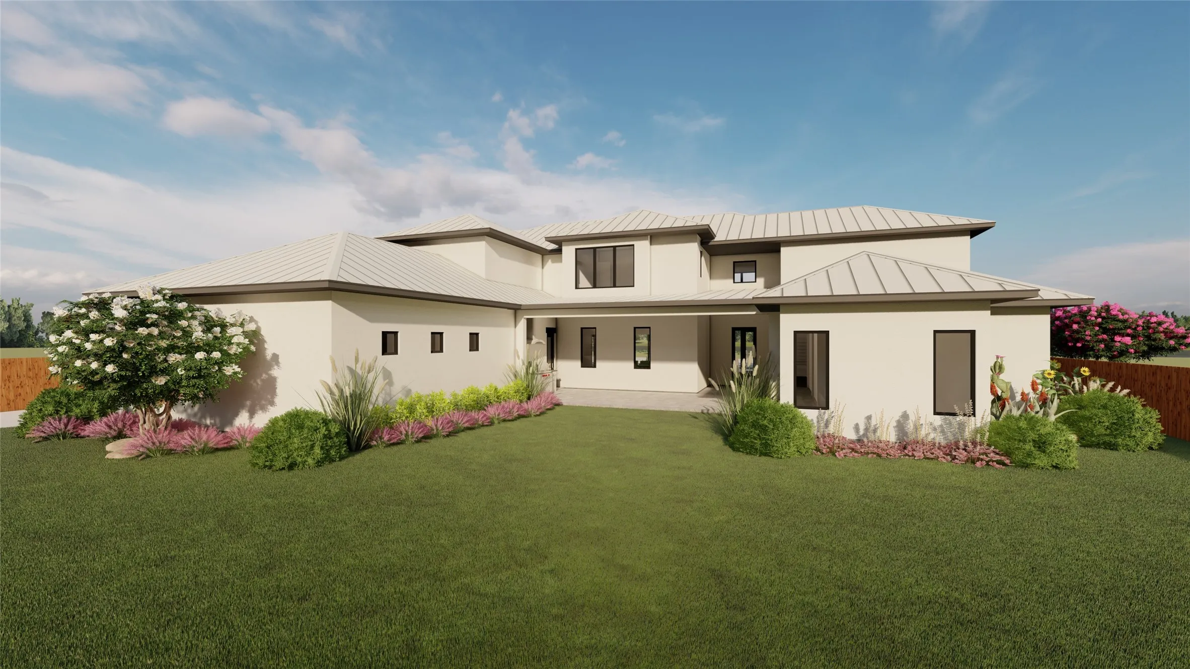 Contemporary residential architecture with a metal roof and light-colored stucco exterior