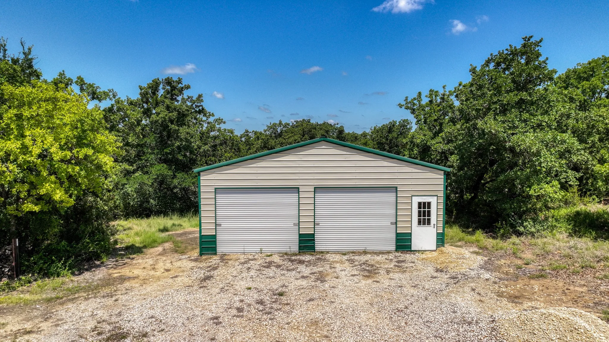 LED lights and electricity are provided in this fully insulated 1200 sq ft garage with concrete floors