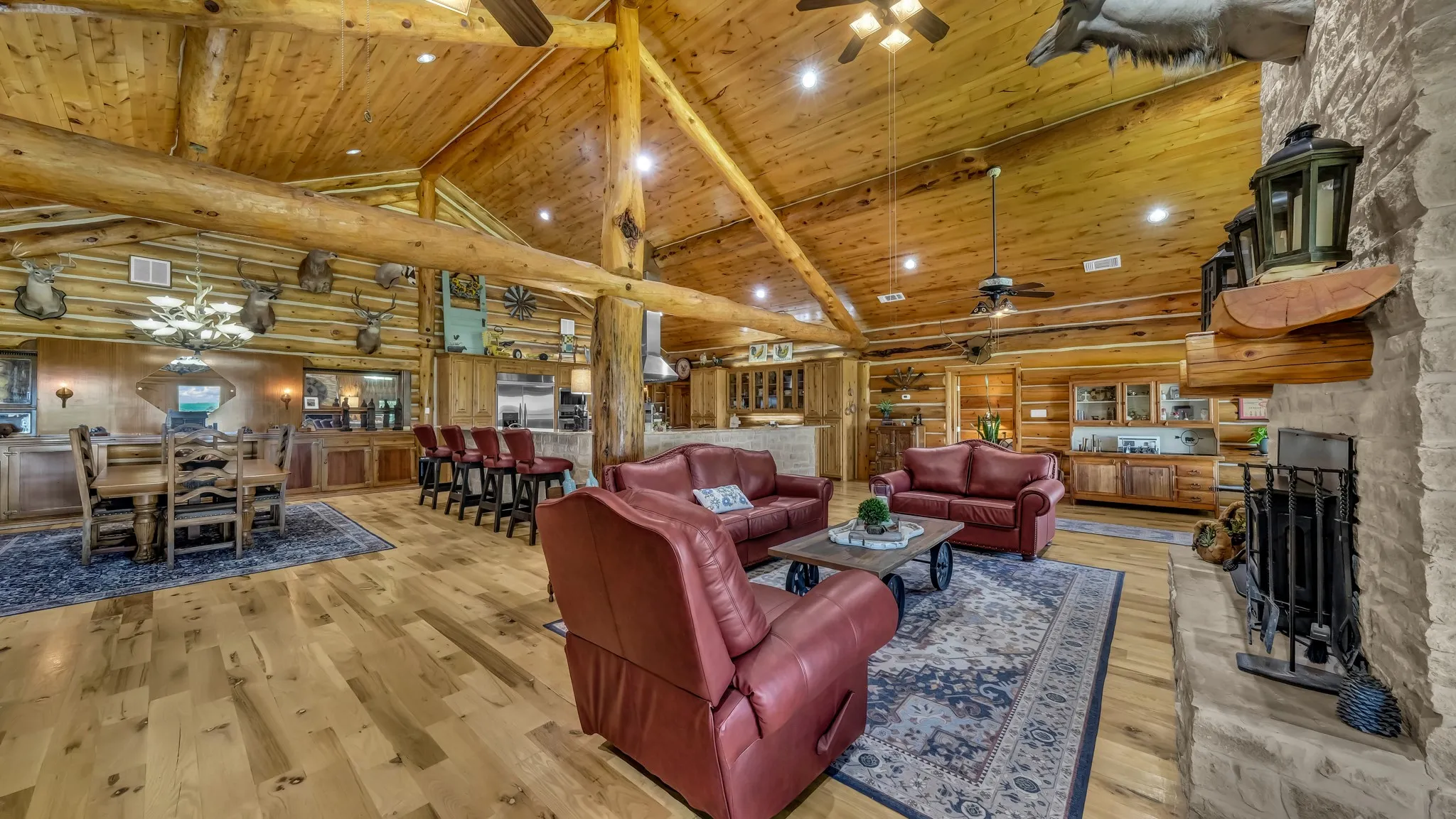 The craftsmanship in this gorgeous home are evident in the soaring 25 foot vaulted ceilings with the massive Ponderosa Pine trusses and Montana Spruce lodge poles.