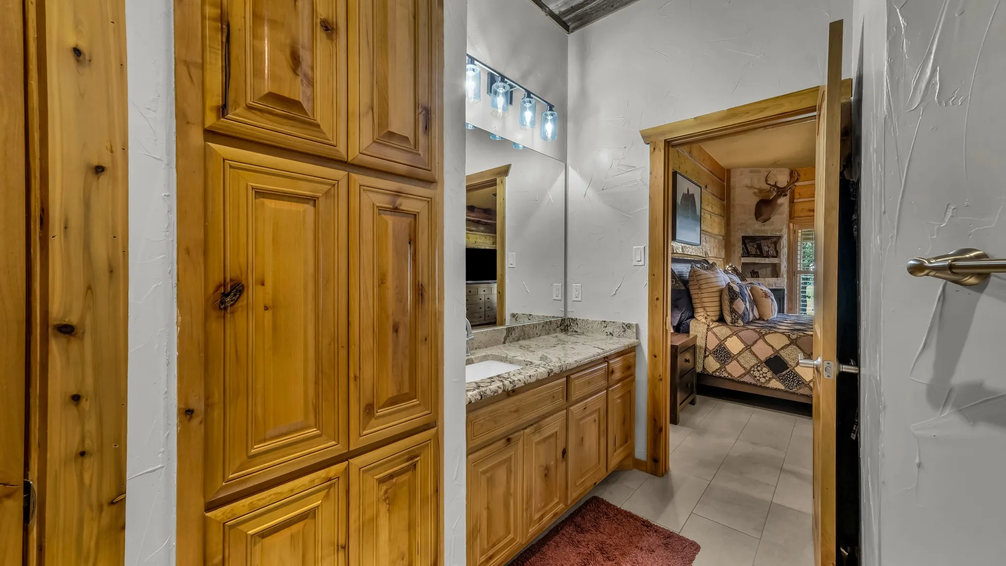 Primary bath has separate vanities.