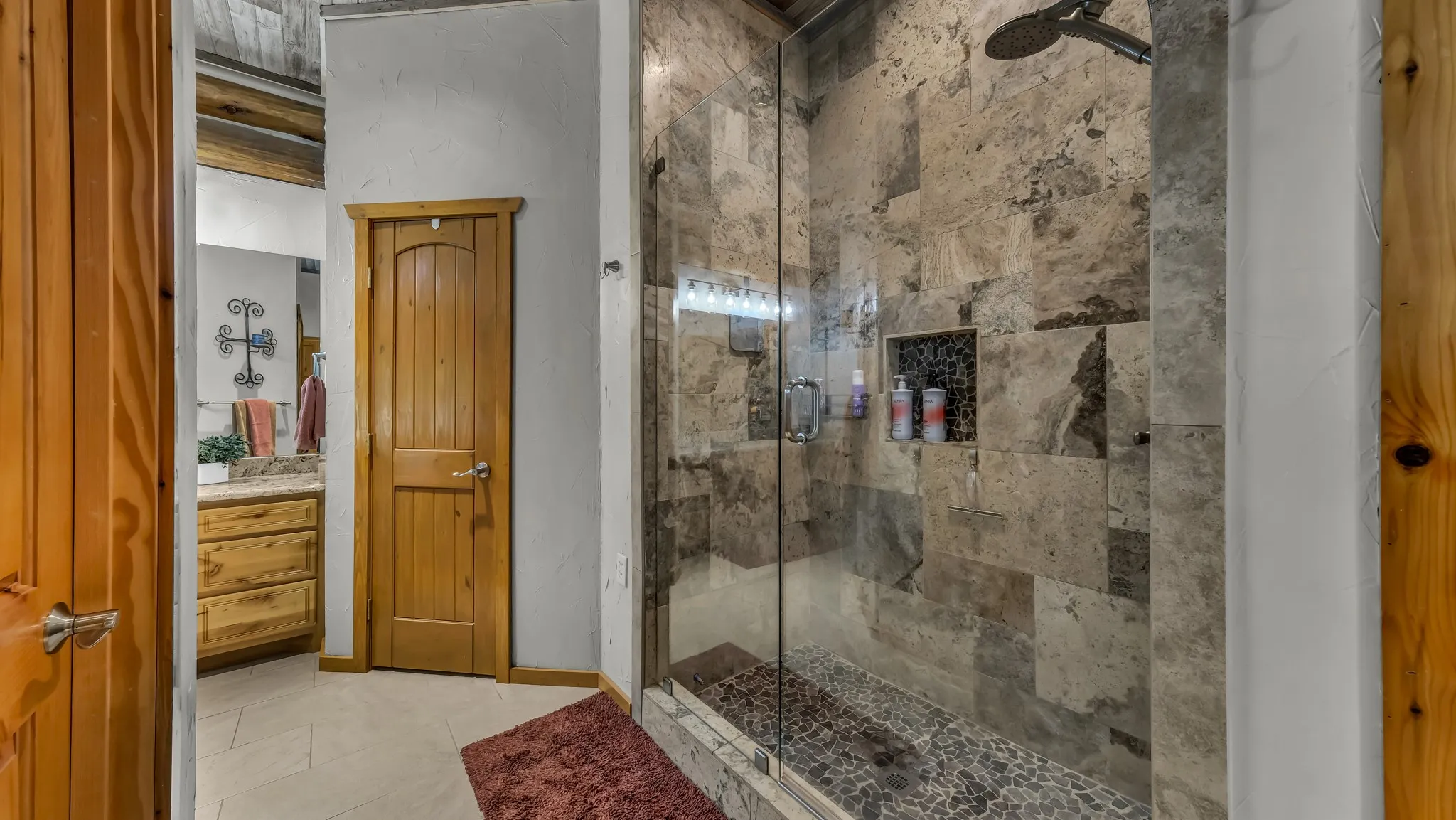 Large roomy updated primary bathroom shower.