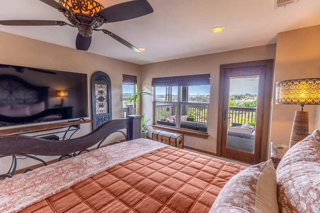 The first thing you'll notice upon entering the primary suite is THE VIEW...exit to the balcony and relax with coffee in the mornings or end your evening enjoying the lake views before bedtime.