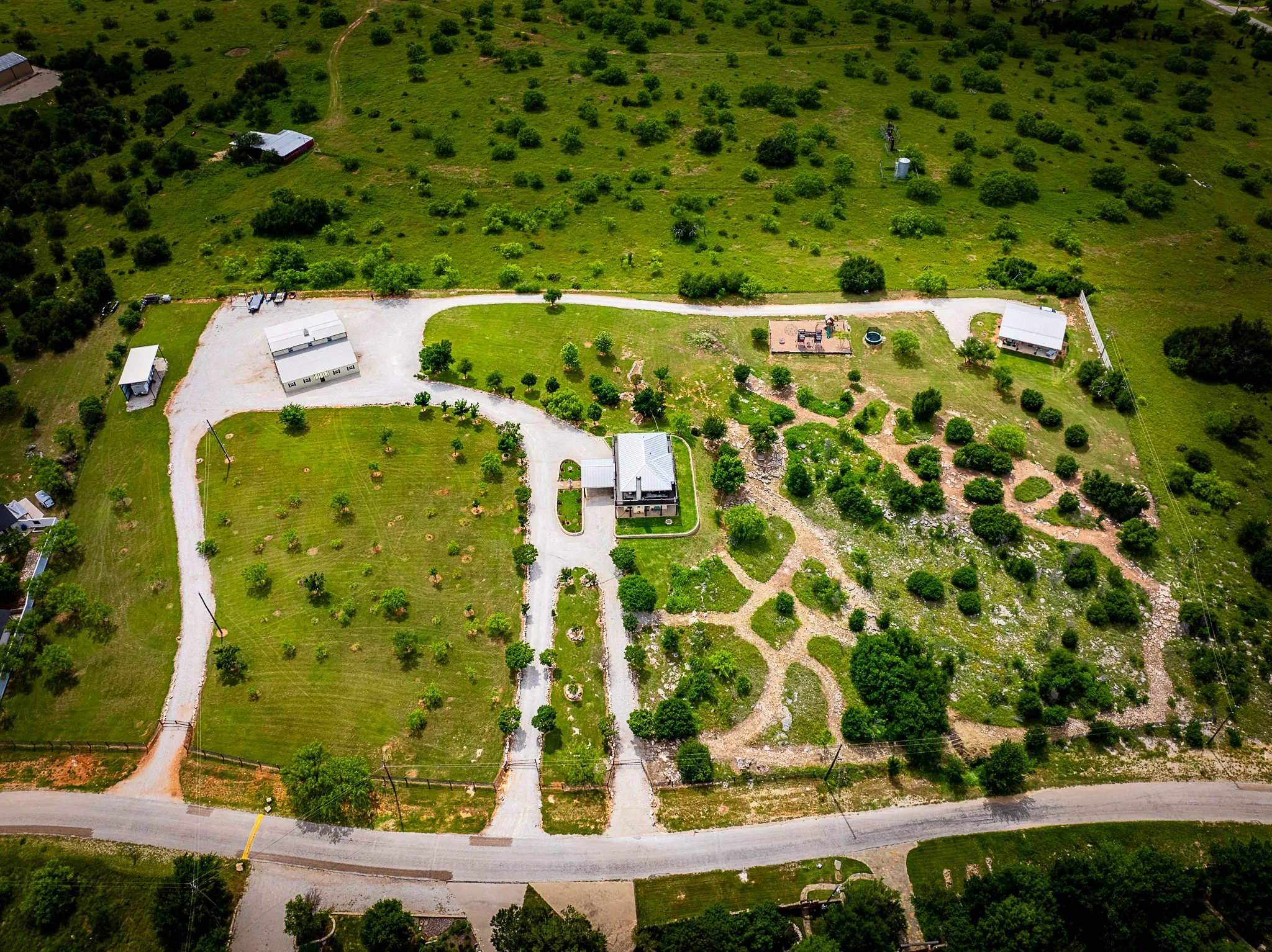 This property has so much to offer...space, storage, multiple structures, recreational trails, and amazing Views!