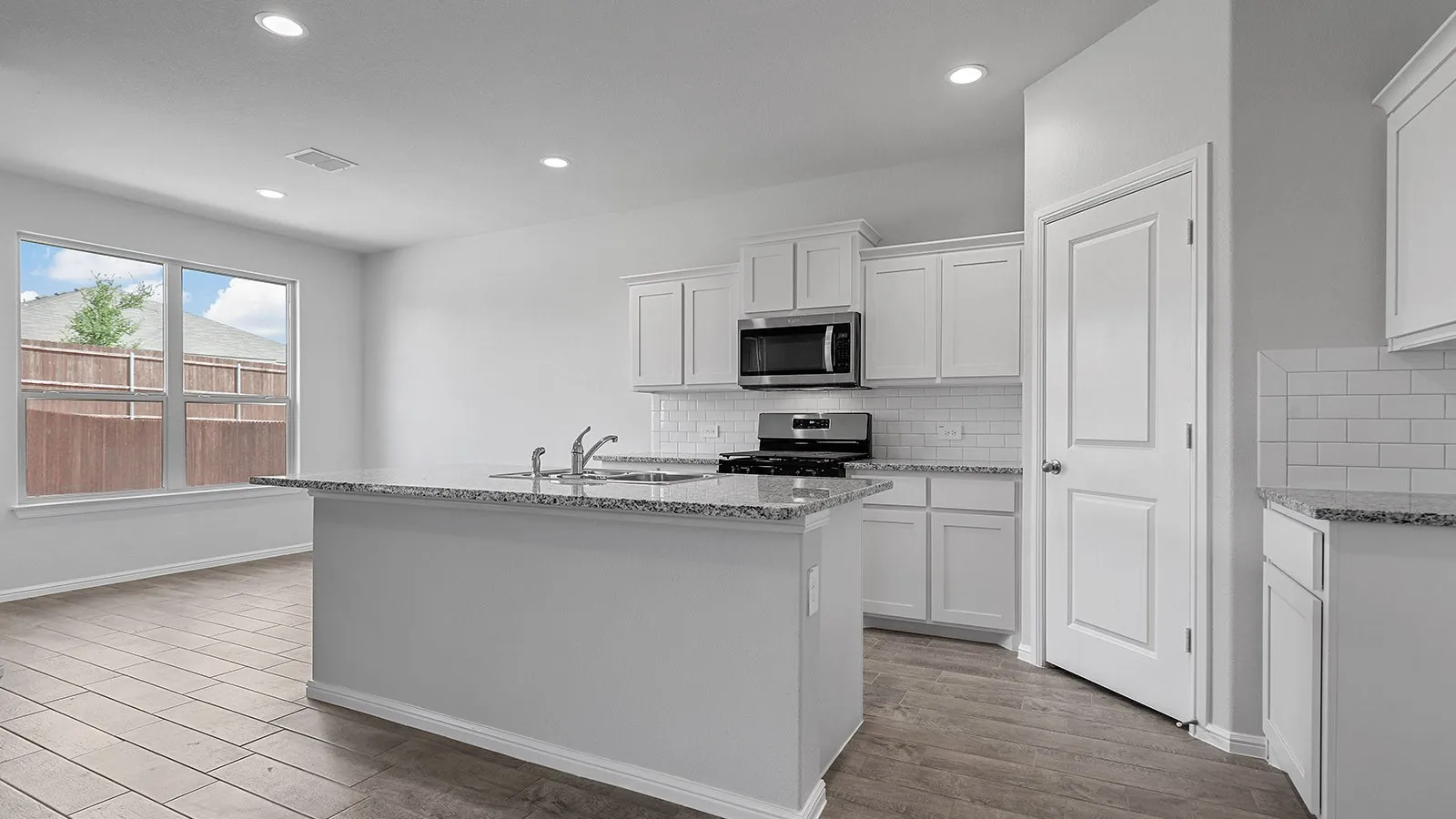 Kitchen - All Home and community information, including pricing, included features, terms, availability and amenities, are subject to change at any time without notice or obligation. All Drawings, pictures, photographs, video, square footages, floor plans, elevations, features, colors and sizes are approximate for illustration purposes only and will vary from the homes as built.
