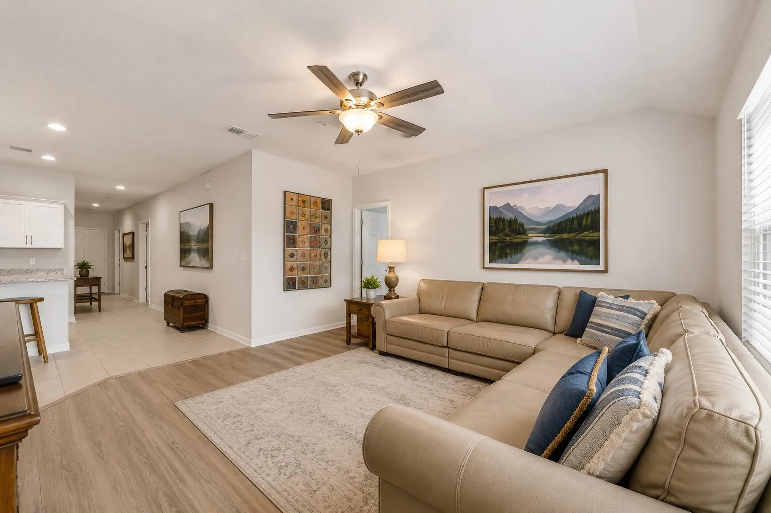 Sectional couch or a couple of recliners.  This is the perfect place to crash after a long day.