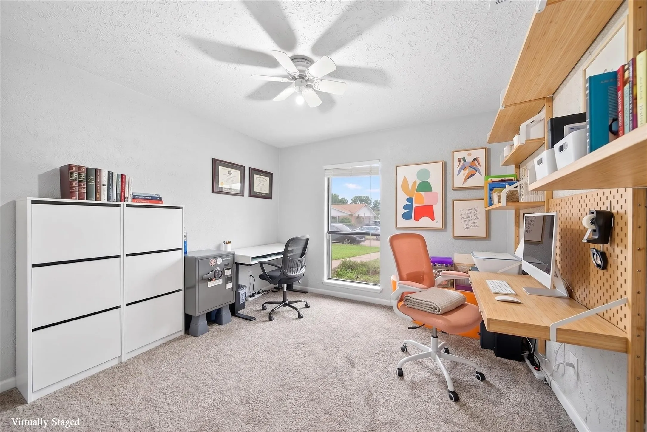 Bright room with light-colored walls and carpeted flooring