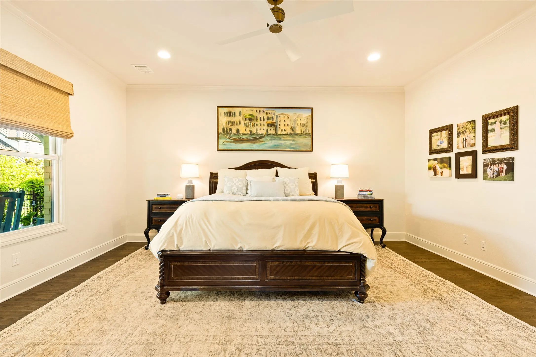 Serene primary suite offers generous proportions, soft natural light, and a calm, sophisticated atmosphere designed for ultimate relaxation.