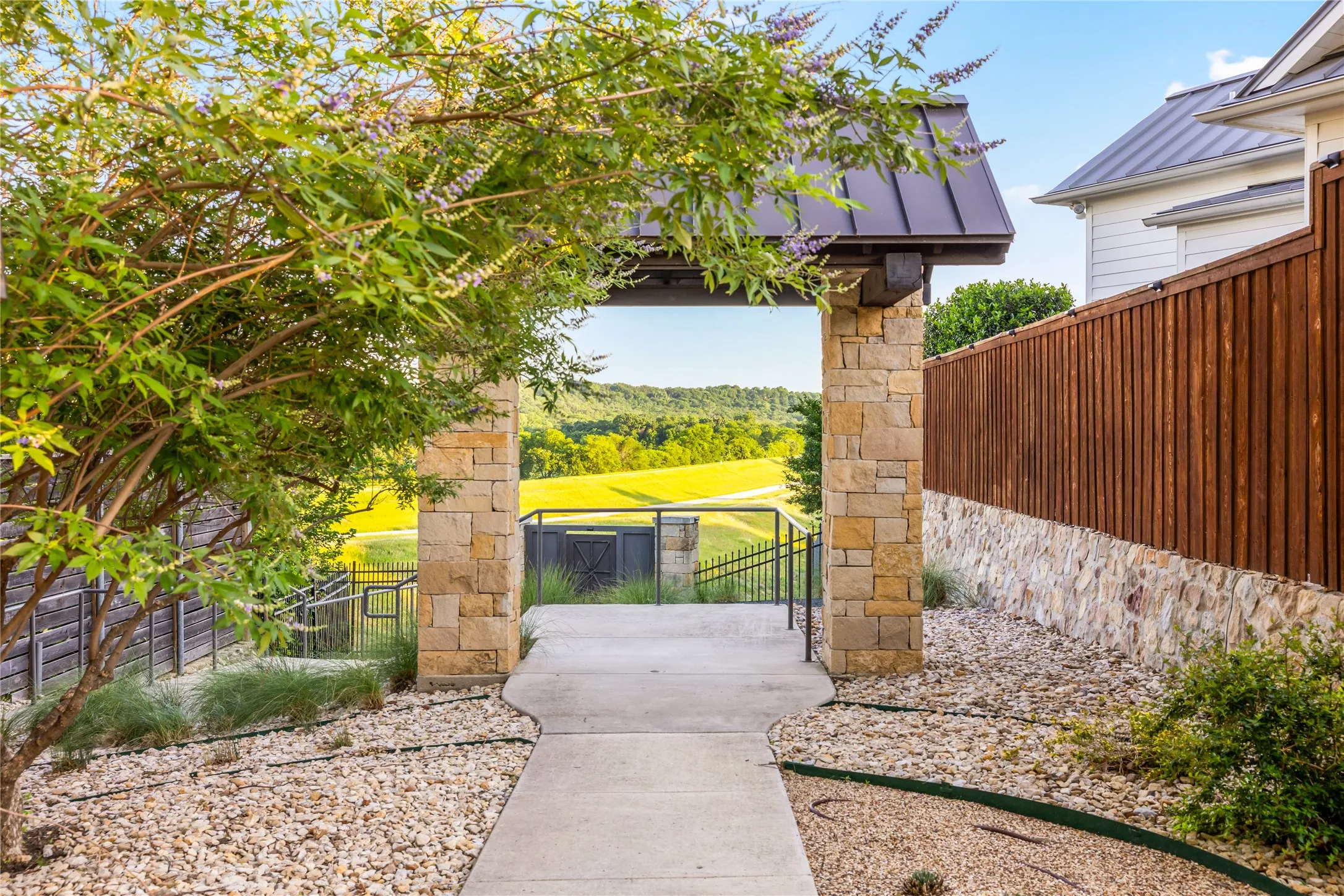 Direct access to the Trinity Trails walking path provides a scenic connection to miles of trails, green space, and outdoor recreation just moments from the home.