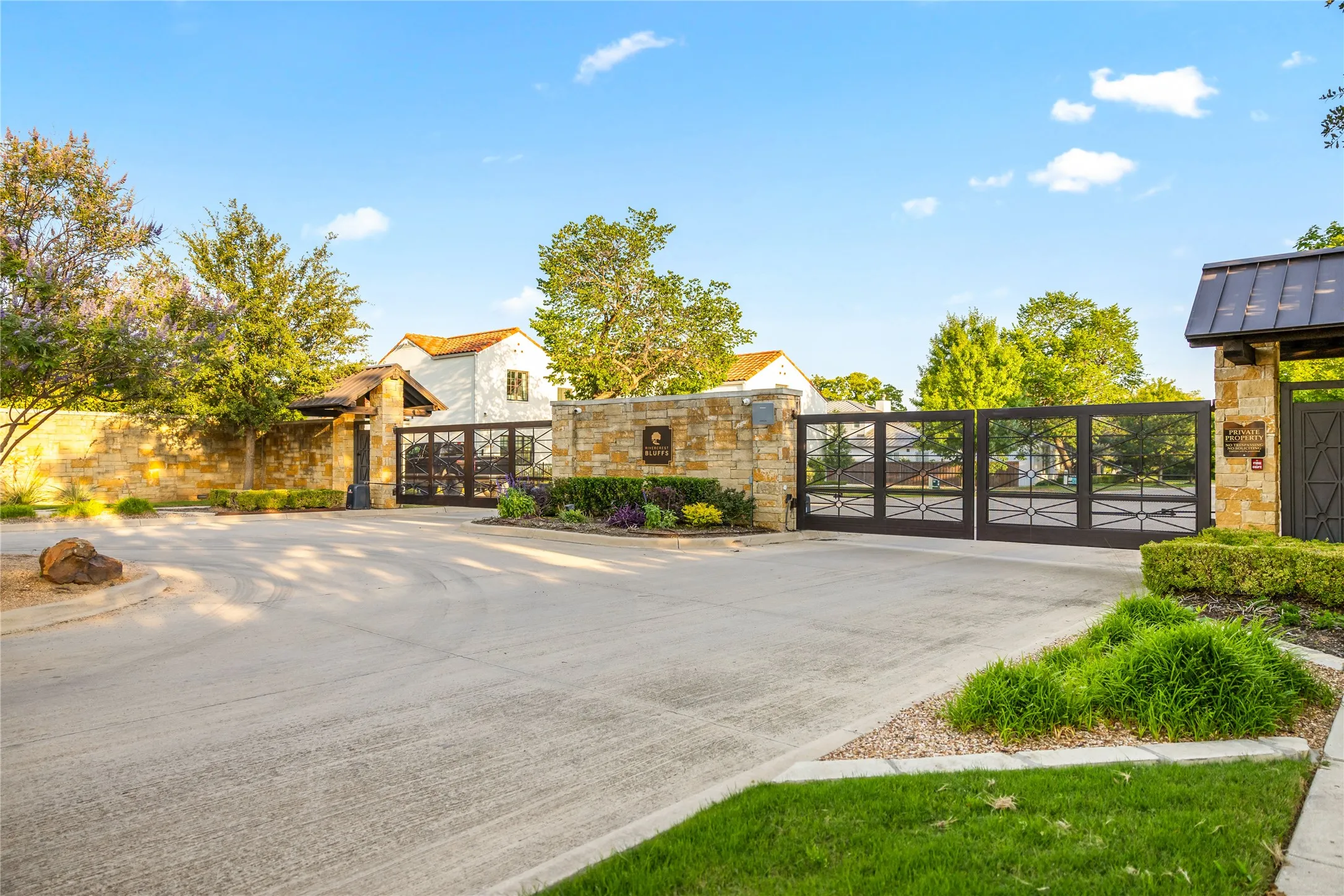 Private gated neighborhood entry offers added security and a welcoming arrival with beautifully maintained landscaping and an upscale community atmosphere.