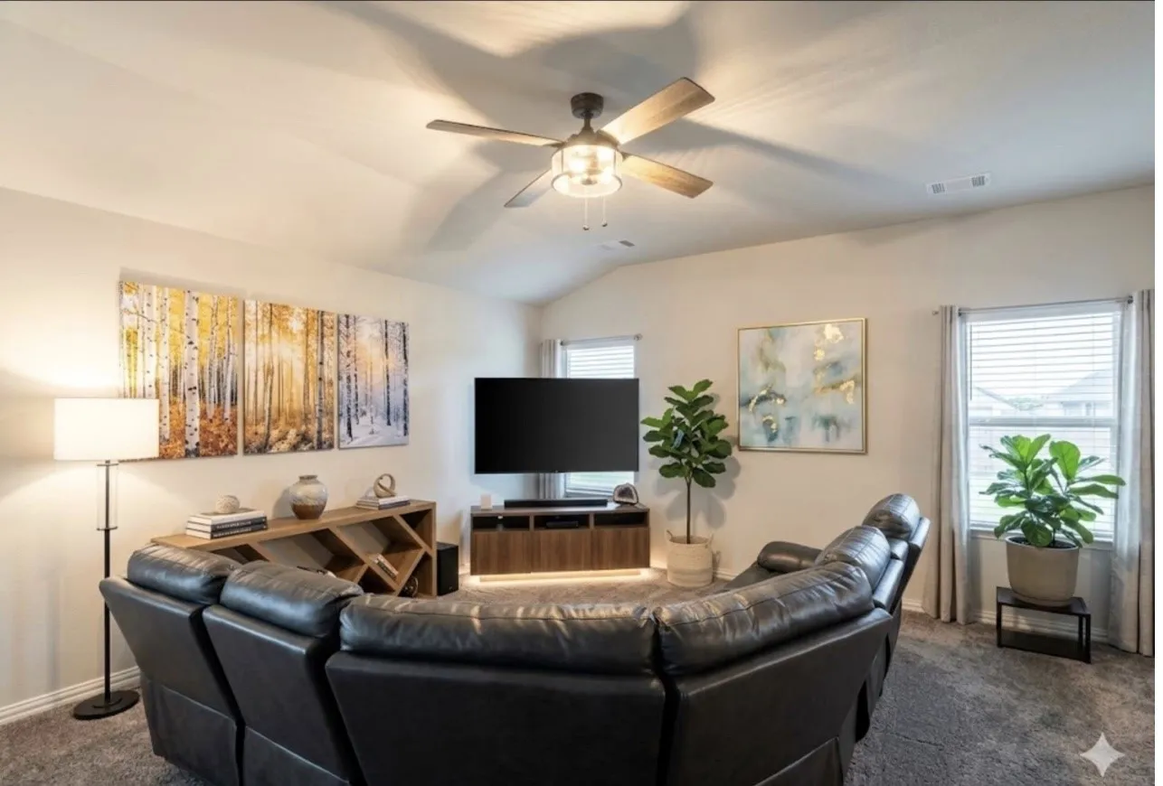 Vaulted ceilings featuring a ceiling fan with integrated lighting