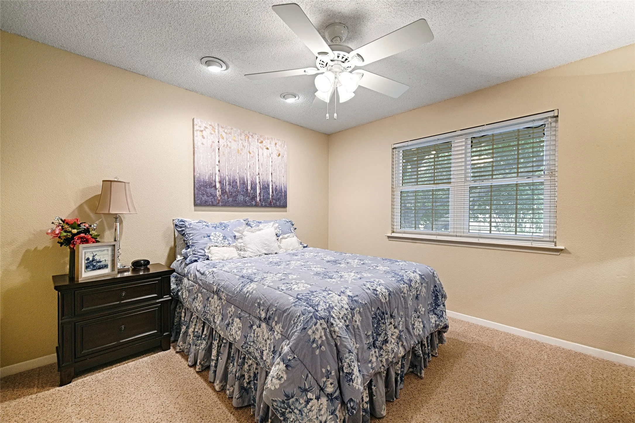 Secondary bedroom with walk-in closet and linen closet