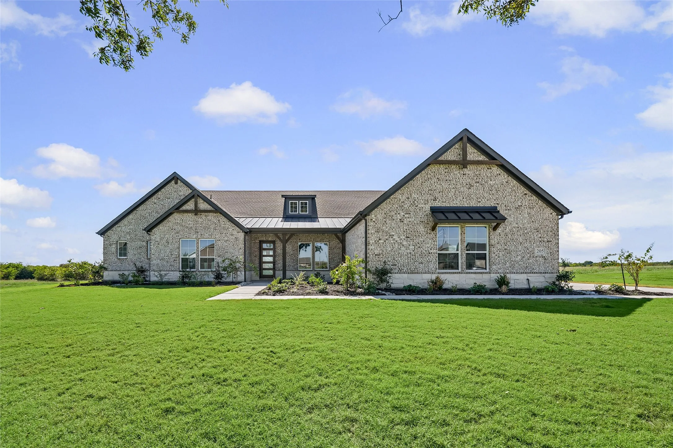 Stone exterior with dark trim accents