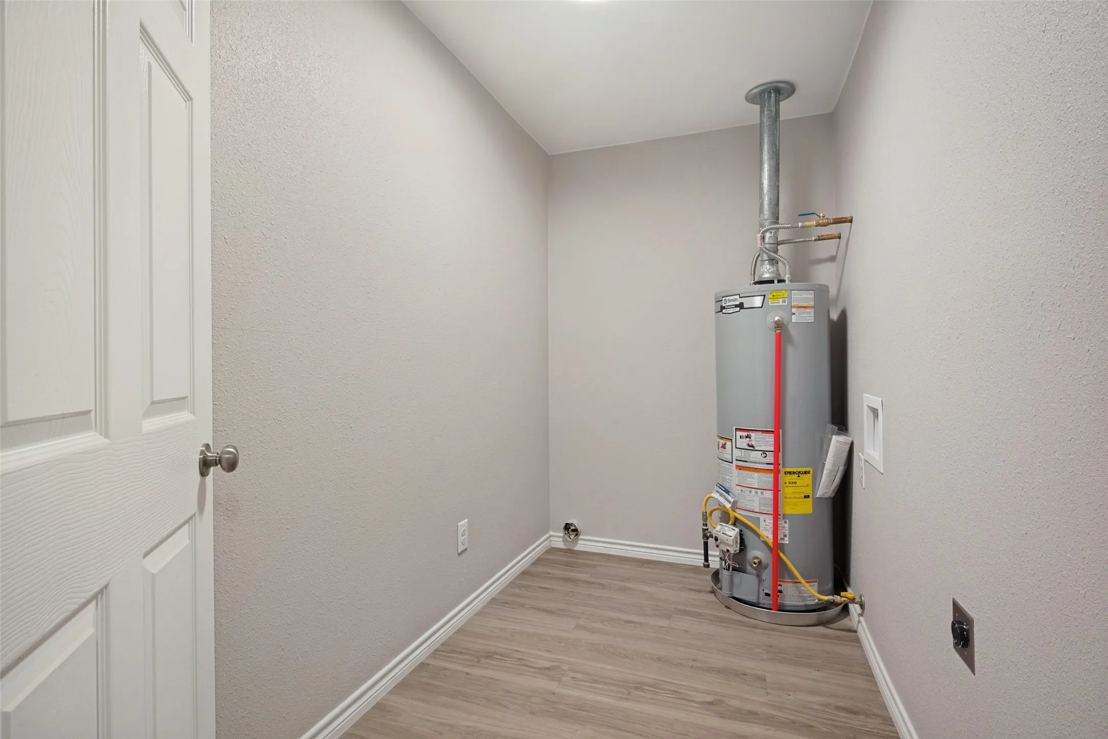 Room for full sized washer and dryer