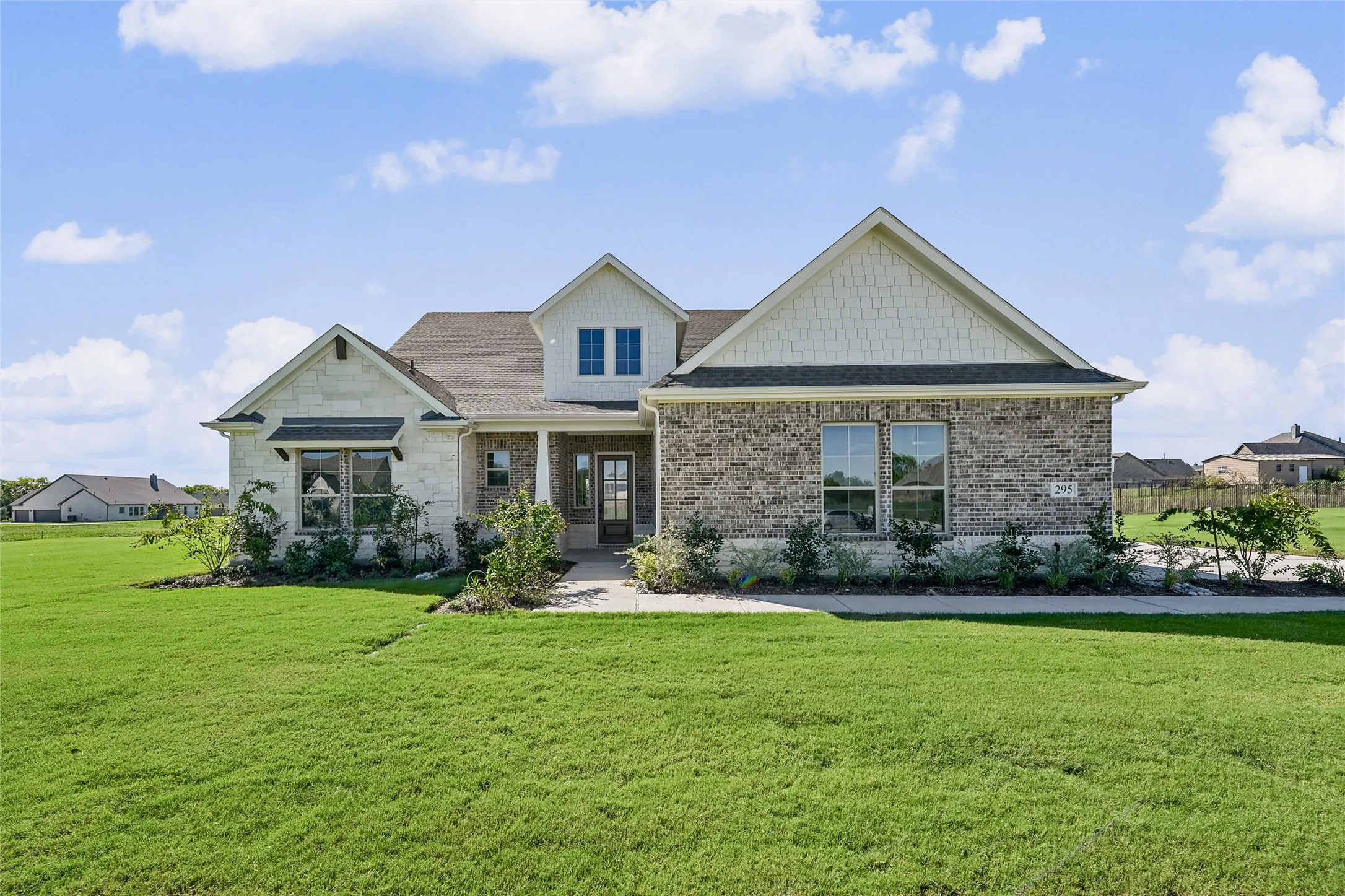 Stone and brick exterior with gabled roof lines