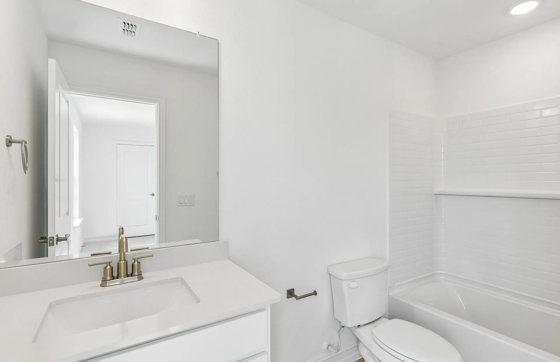 Secondary bath with tile surrounded shower
