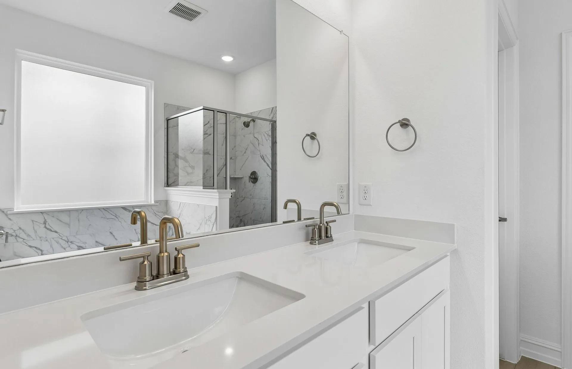 Private owners bath with double vanity