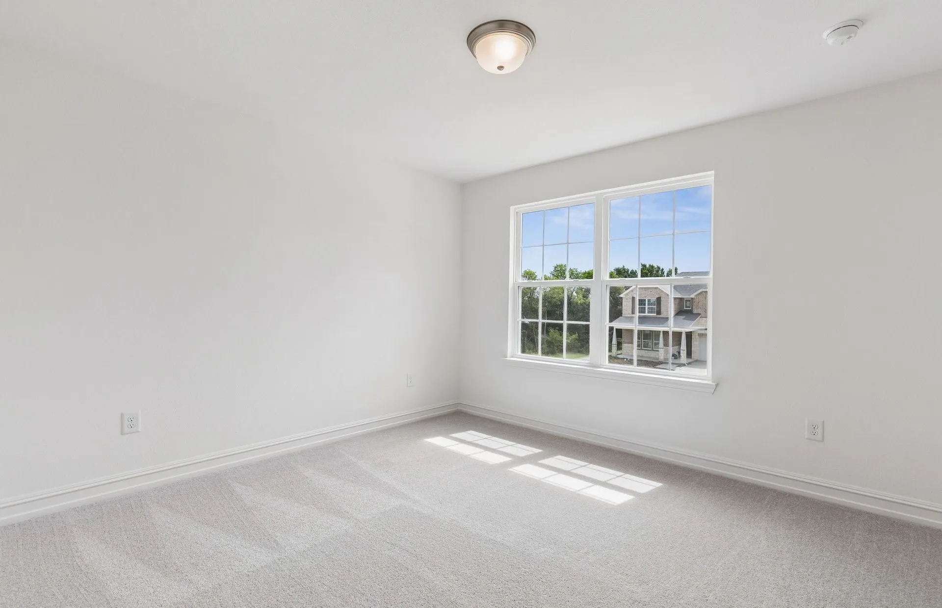Secondary bedroom with large window
