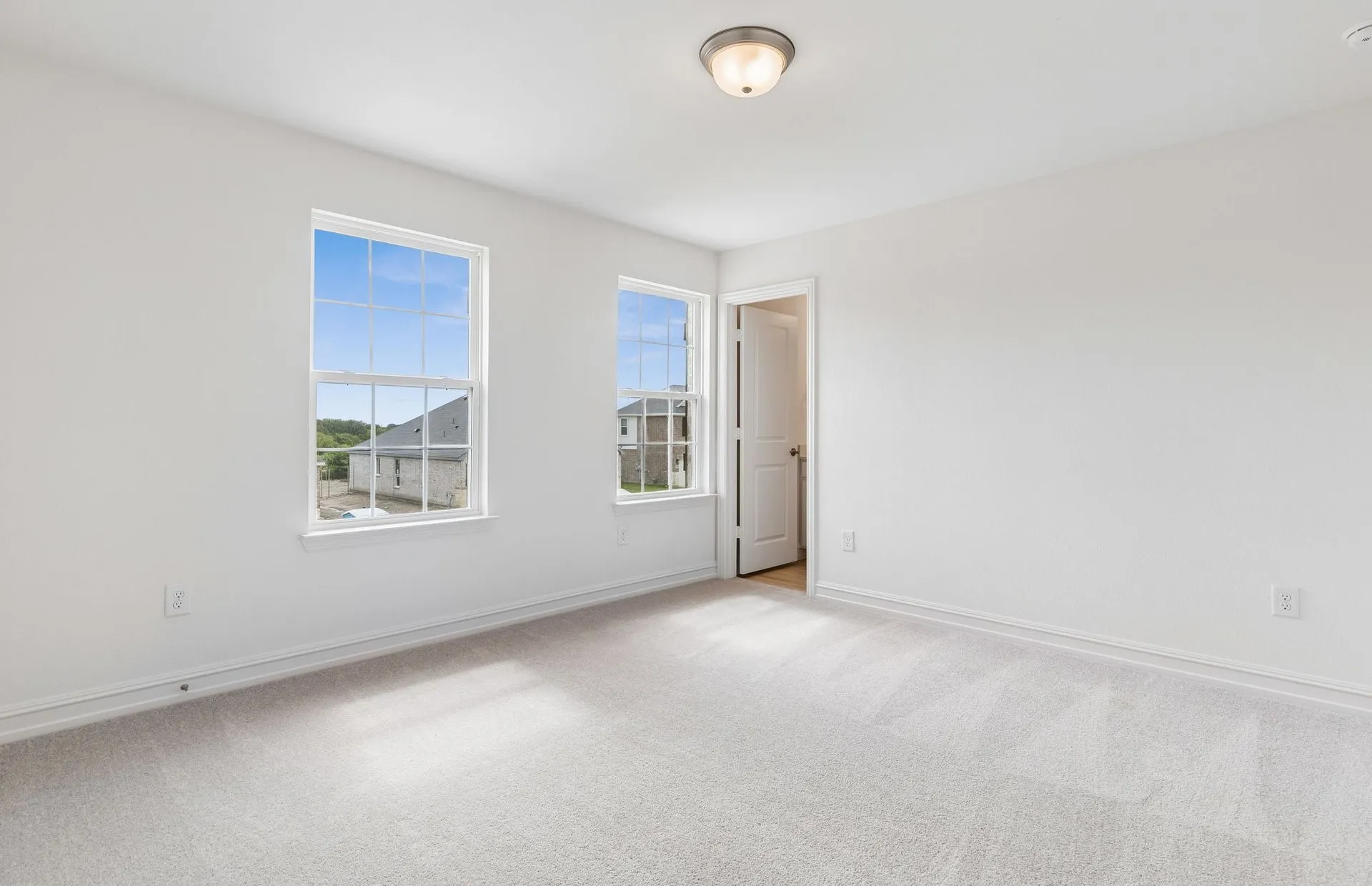 Secondary bedroom with large​​‌​​​​‌​​‌‌​‌‌​​​‌‌​‌​‌​‌​​​‌​​ windows